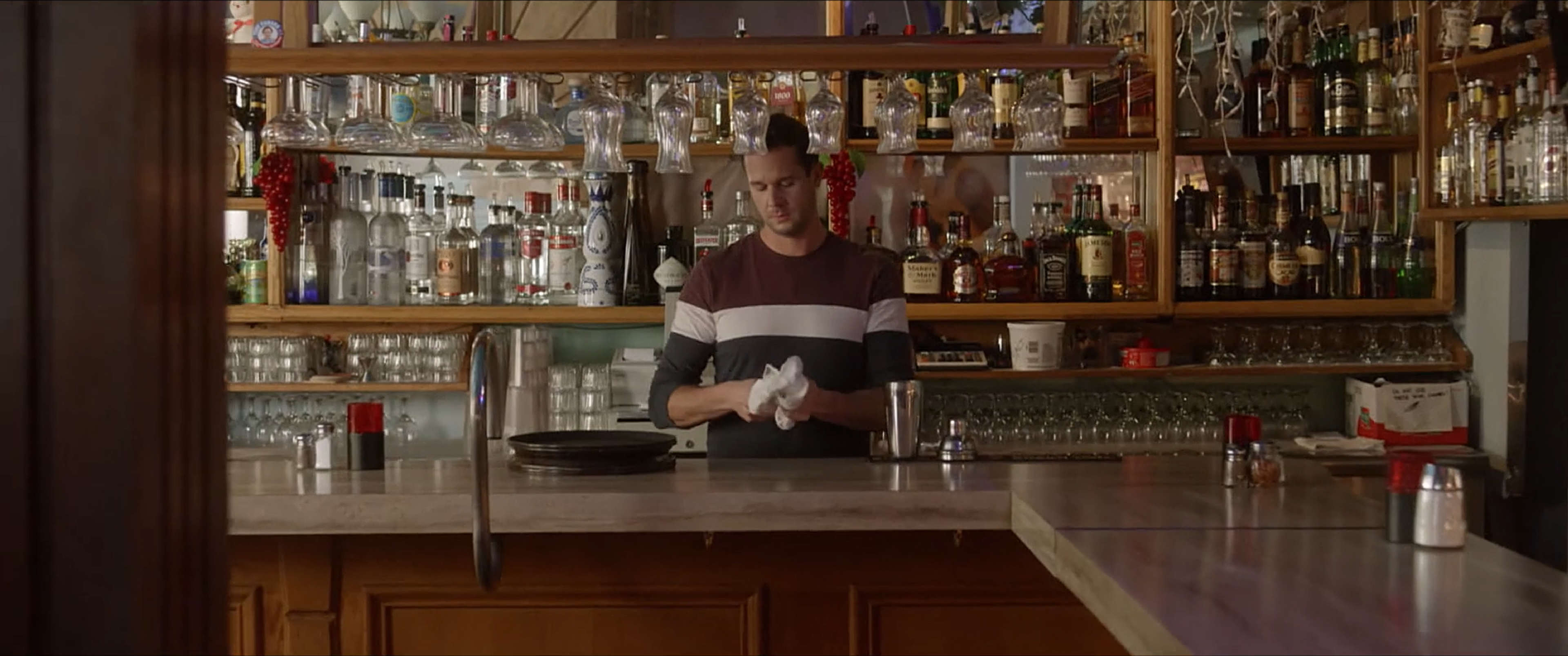 Allan approaches Dean at the bar
