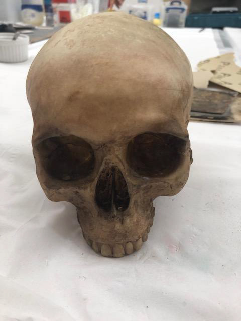 A Polyurethane resin cast taken from a Hallloween decoration.   Painted using Dirty Down spray paints and finer details added by hand.