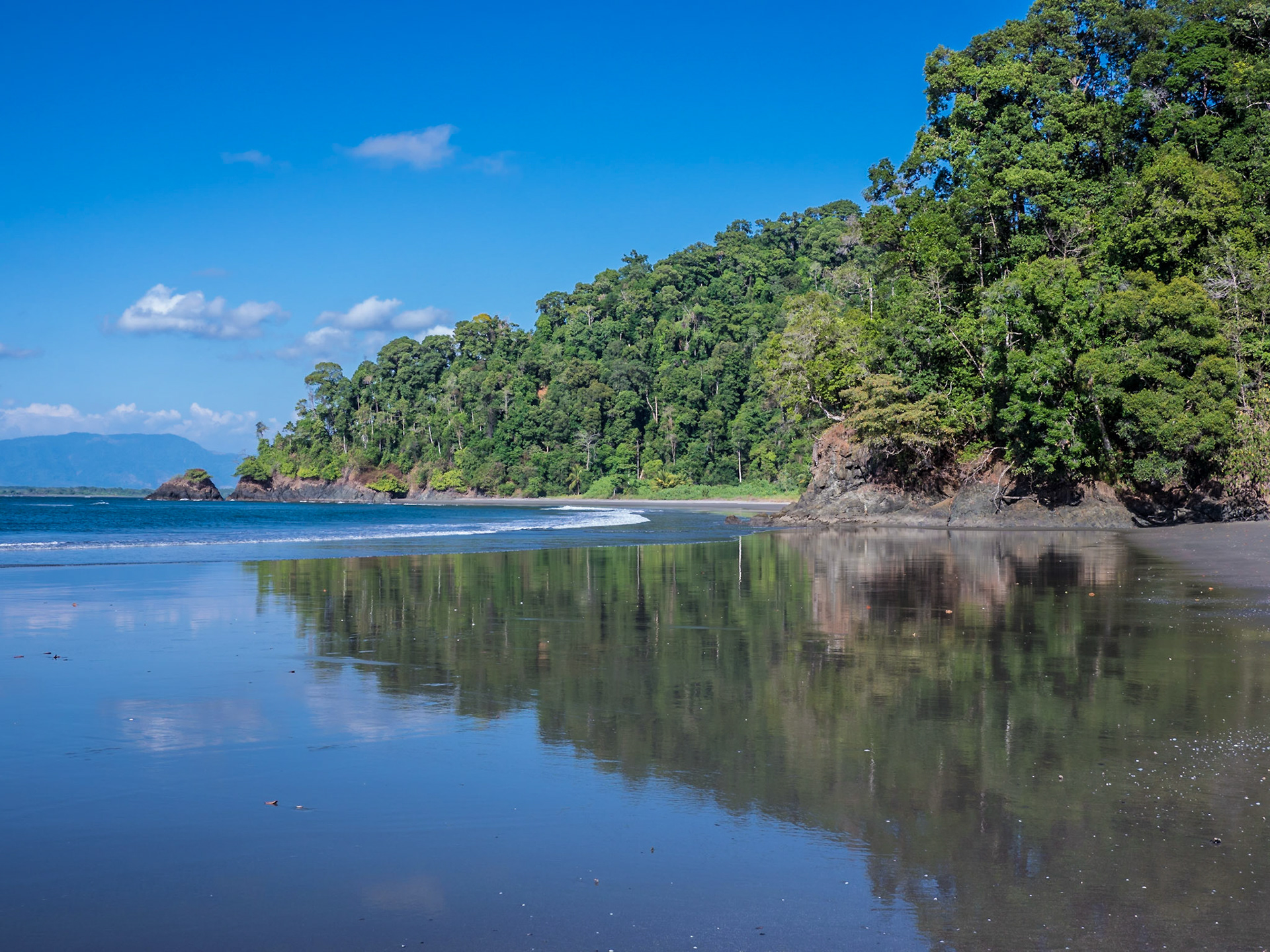 Beautiful reflections on this natural beach in Costa Rica.