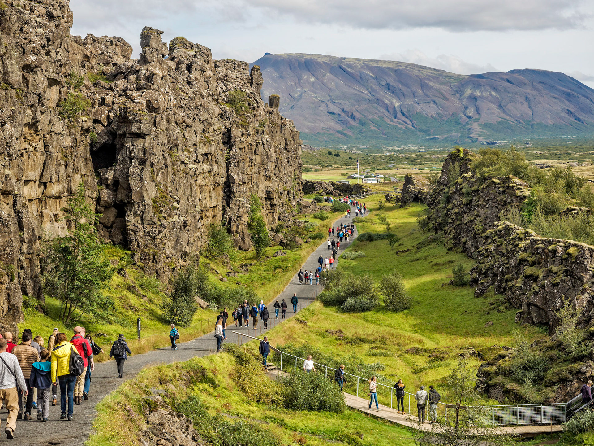 Walking the trail inside Pingvellir National Park, Iceland.