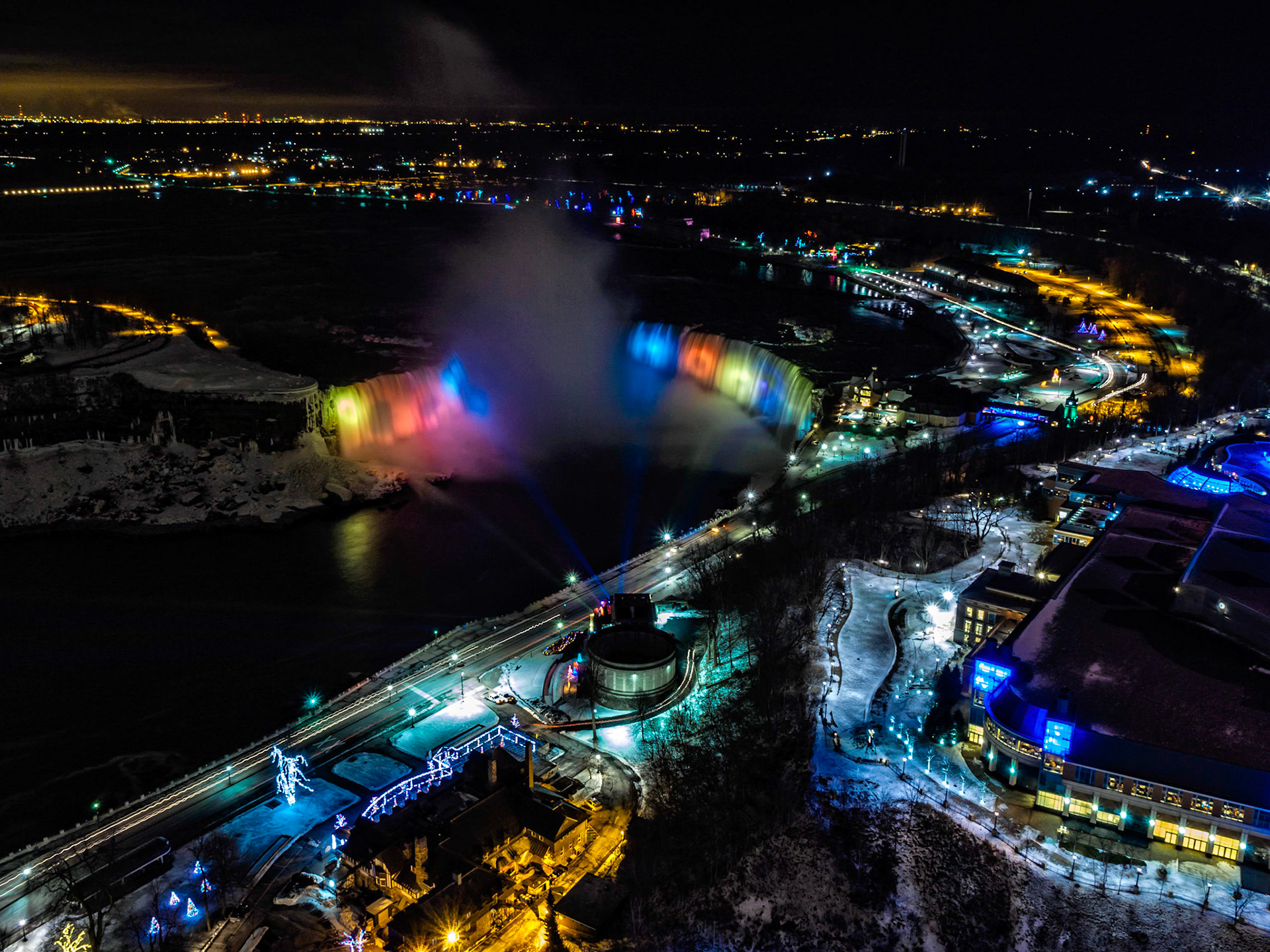 Night view of the American and Horseshoe Falls in winter from Skylon Tower.