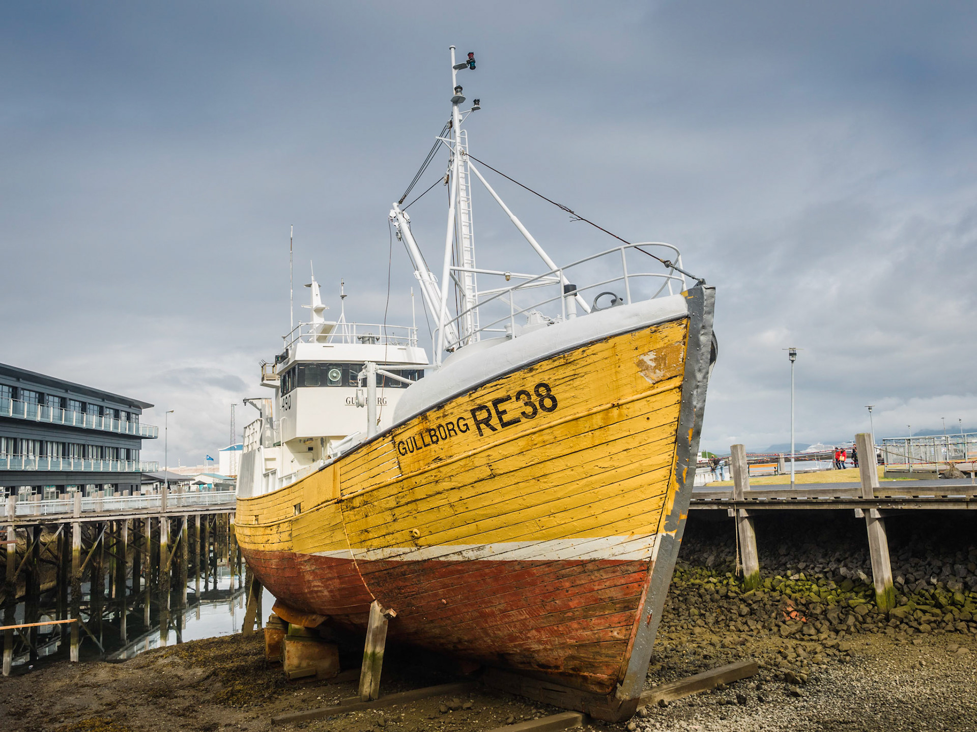 An old fishing trawler awaits restoration outside Reykjavik, Iceland's marine museum.