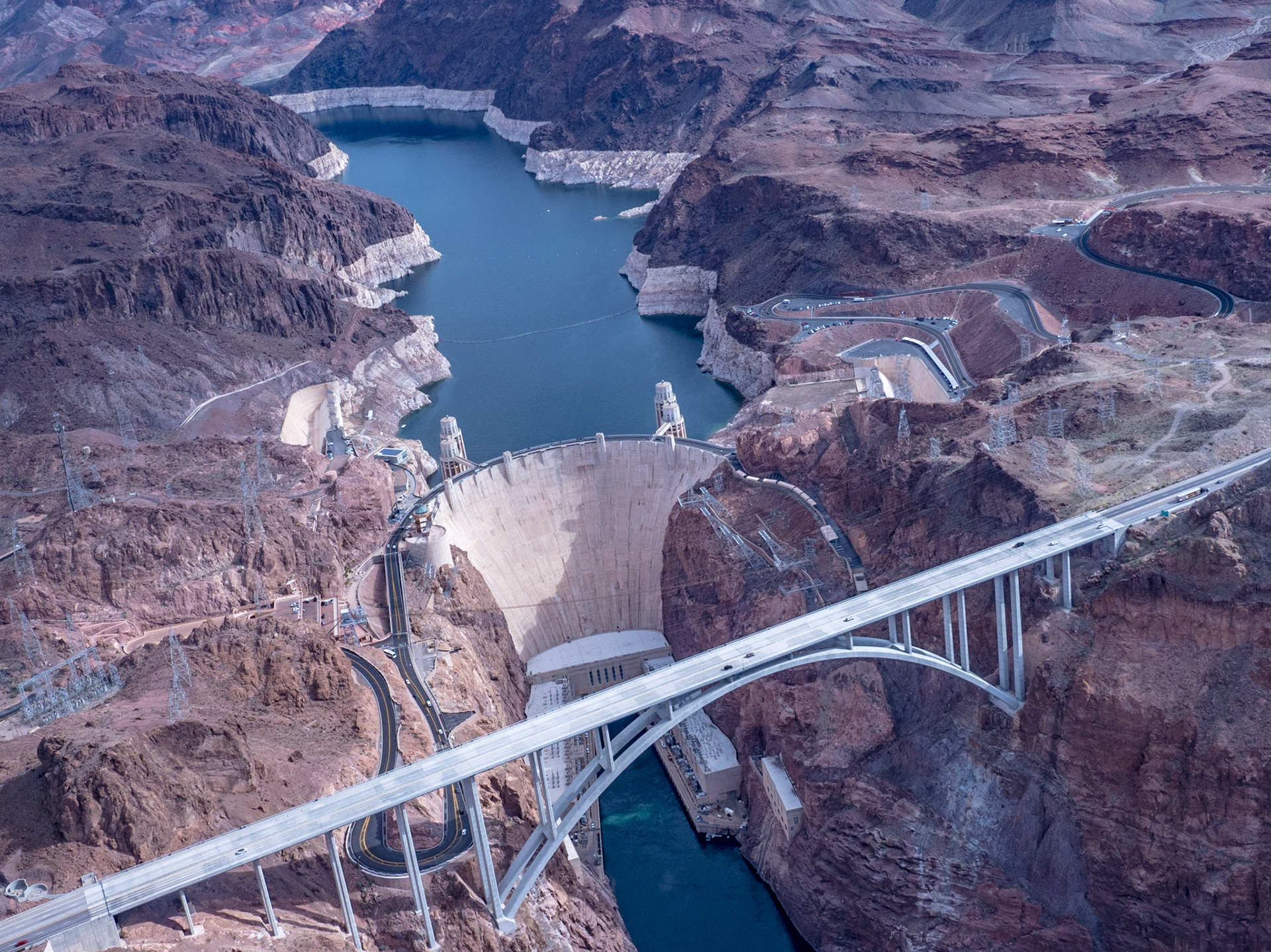 The aerial view flying over Hoover Dam in Nevada.