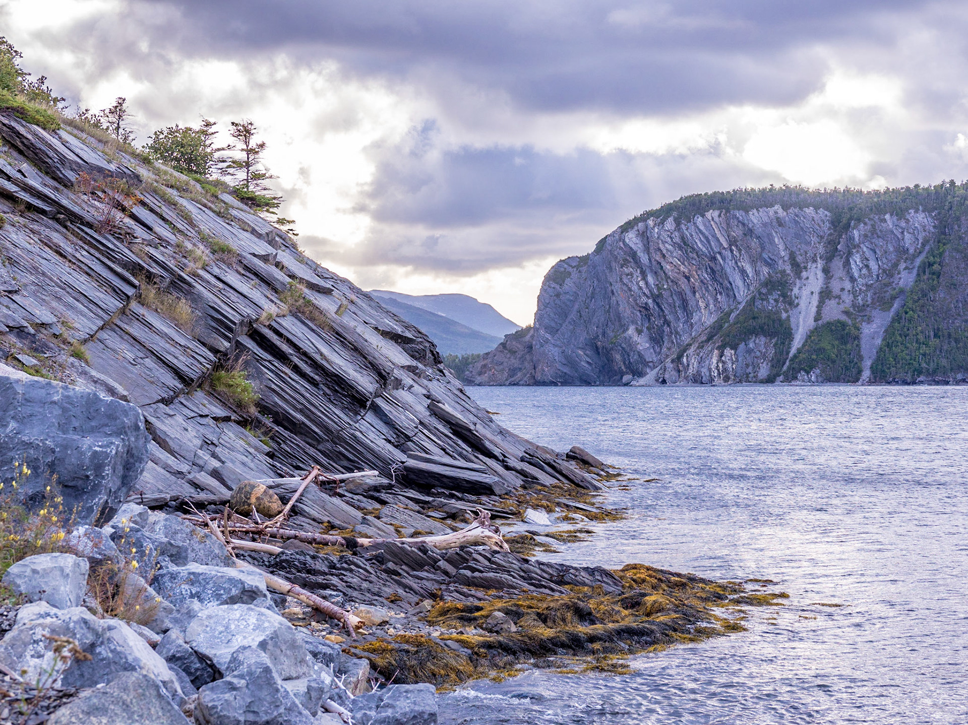 Dramatic rock formations along the coastline in Norris Point Newfoundland.
