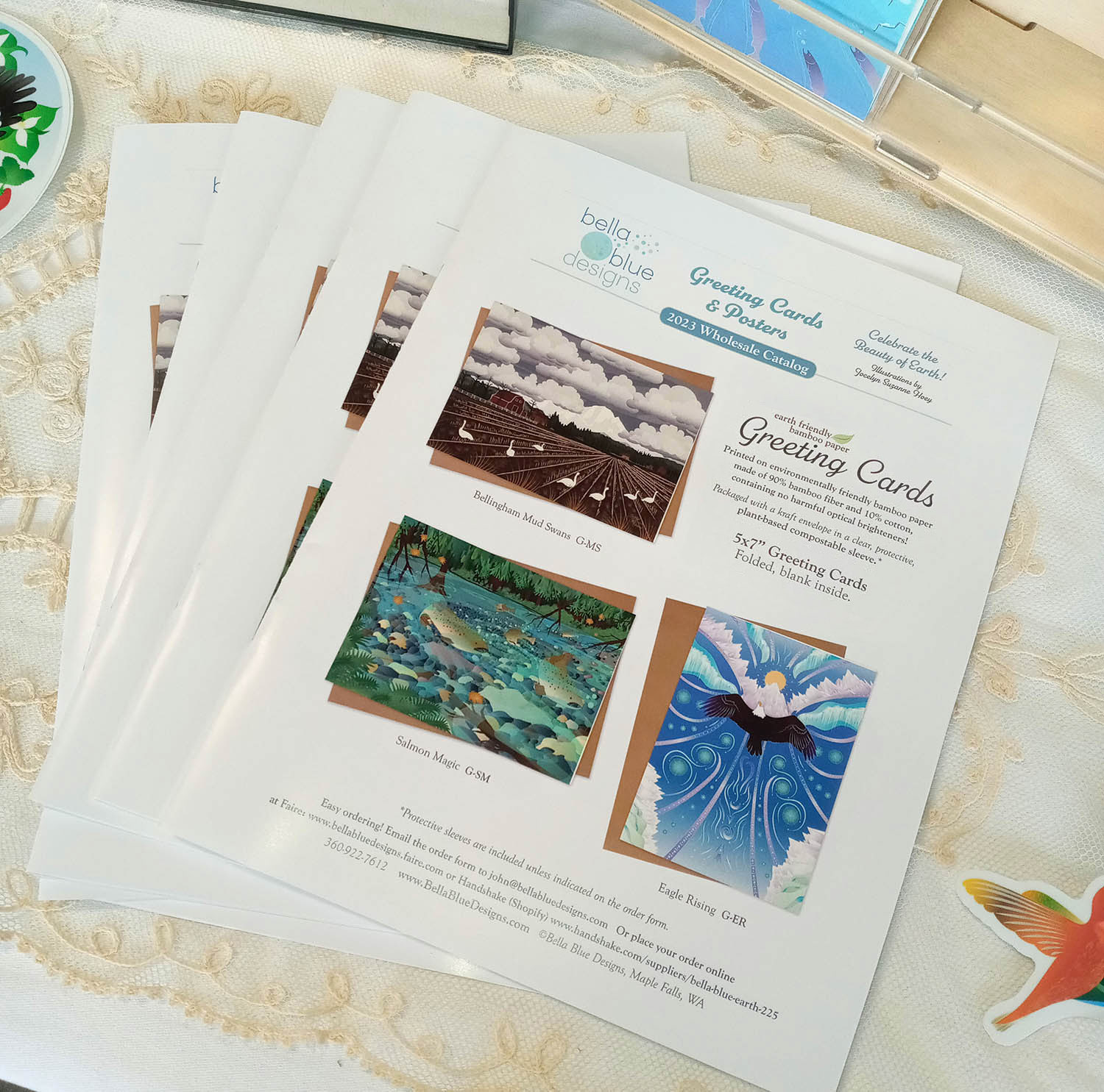 Wholesale printed line sheets sitting on a display table.