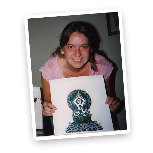 photo of woman holding artwork