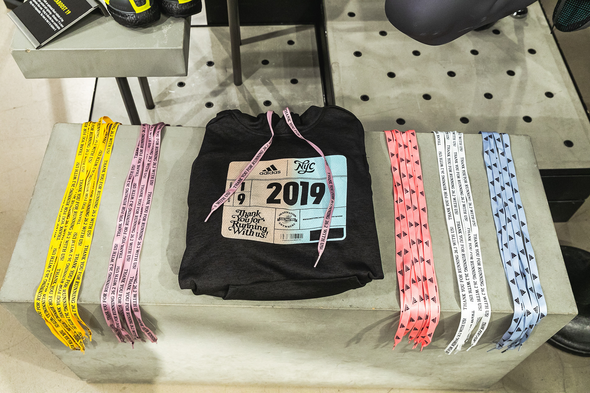 Close up of hoodie and shoe laces that have been customized.