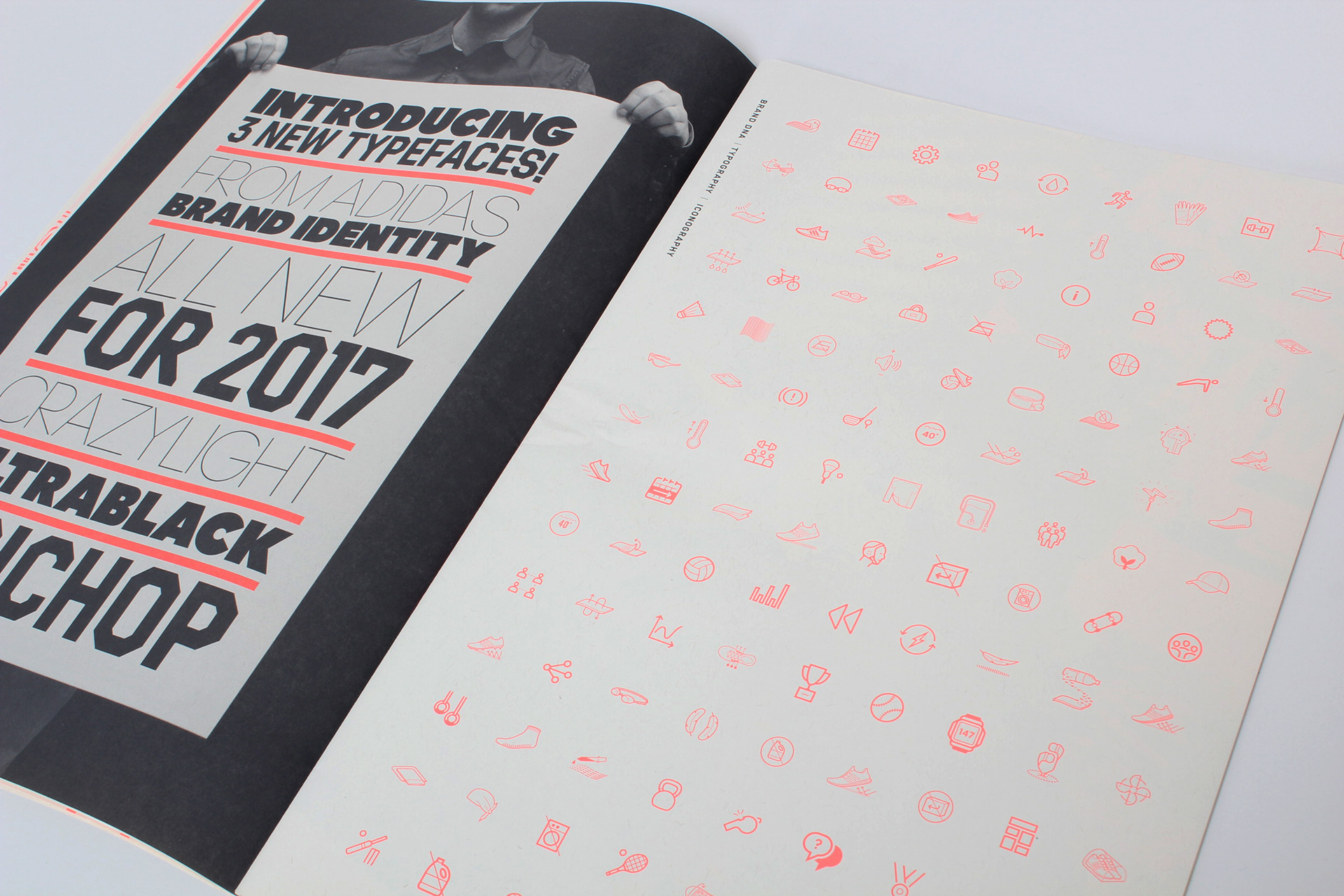 Photo of spread showcasing new brand typeface and icons.