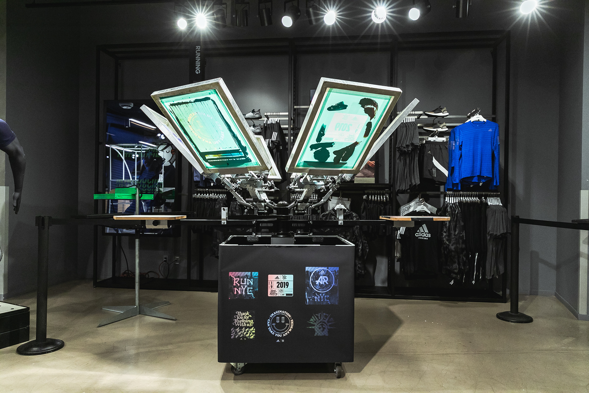 Photo of the 6 palette screen printing station used at the event for customization.
