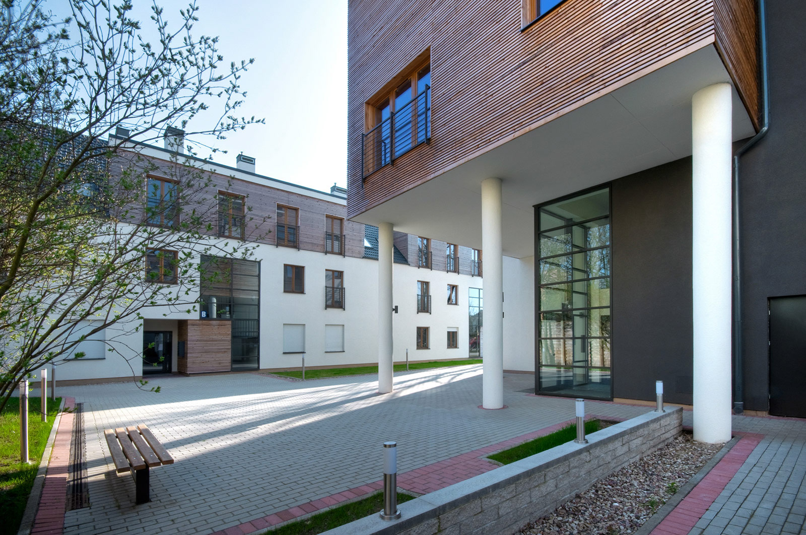 Fotografie architektury budynków mieszkalnych i użyteczności publicznej dla biura architektonicznego.