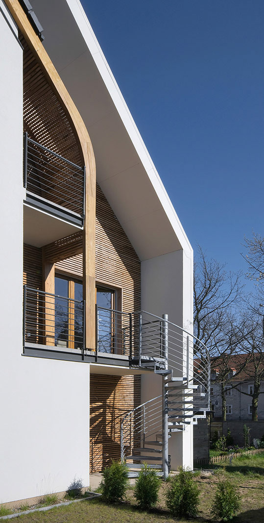 Fotografie architektury budynków mieszkalnych i użyteczności publicznej dla biura architektonicznego.