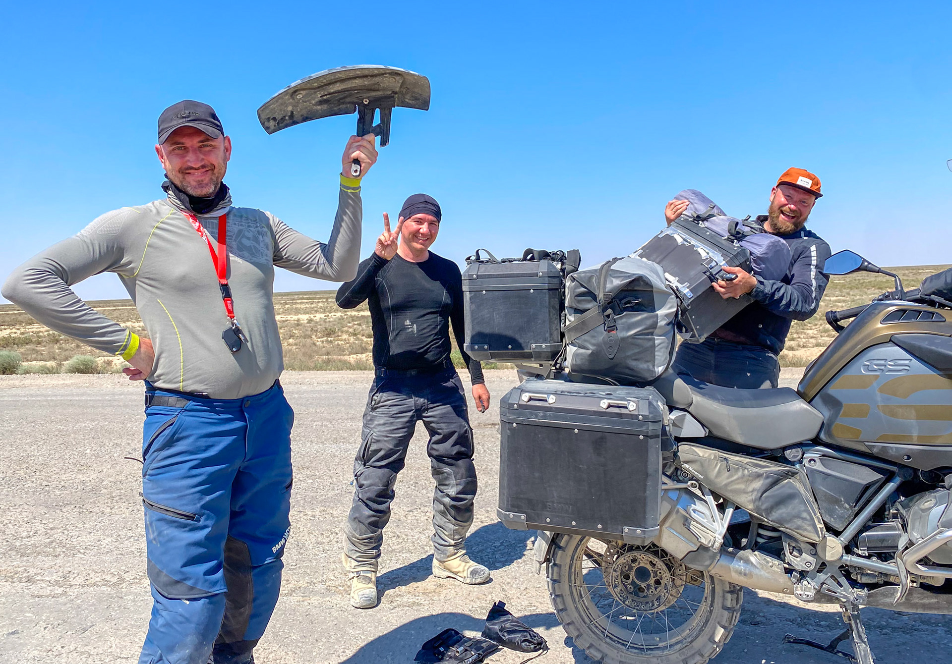 Our bikes really suffered on that road and Ivan's mud-guard completely broke