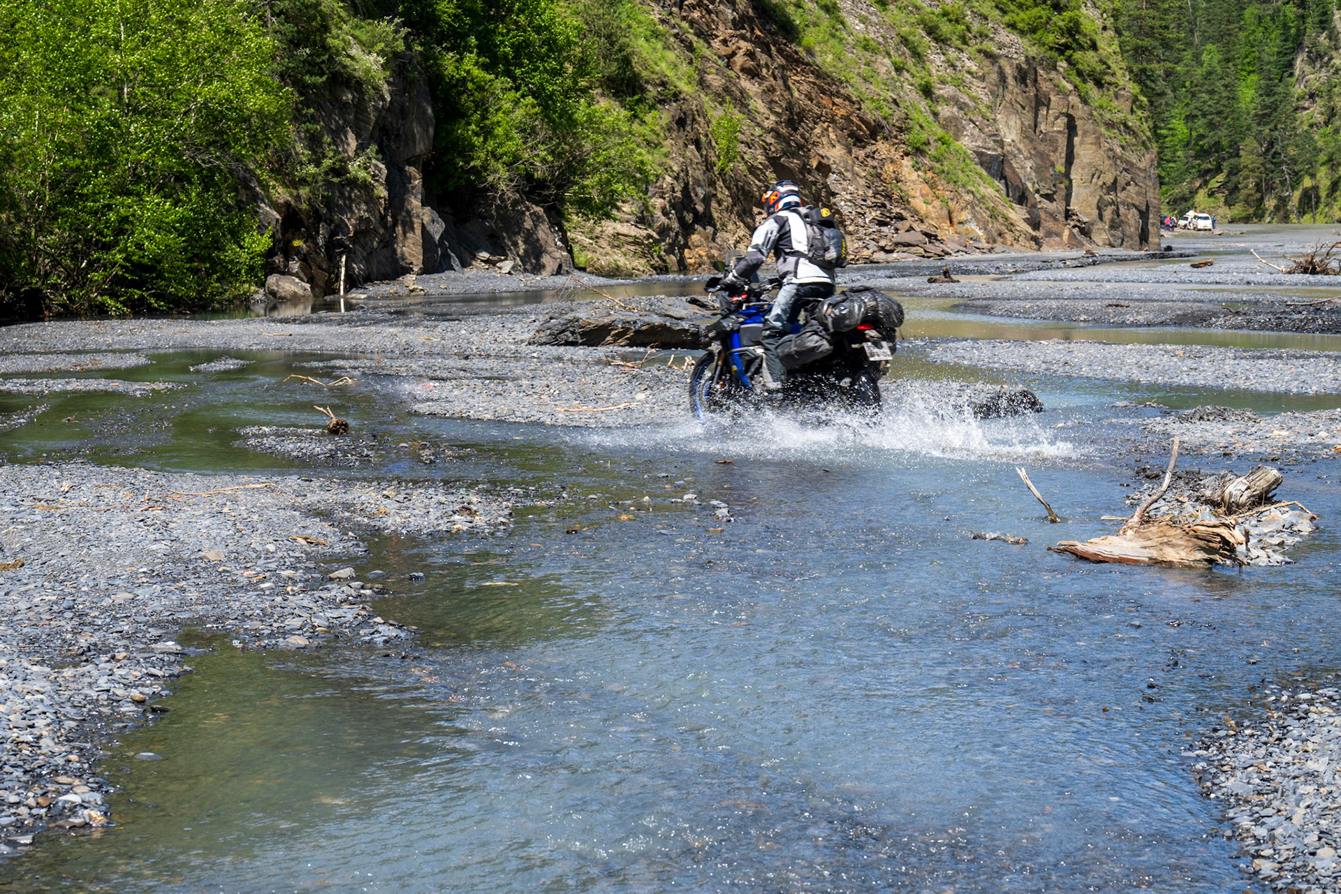 The road and the river, intertwined, become one