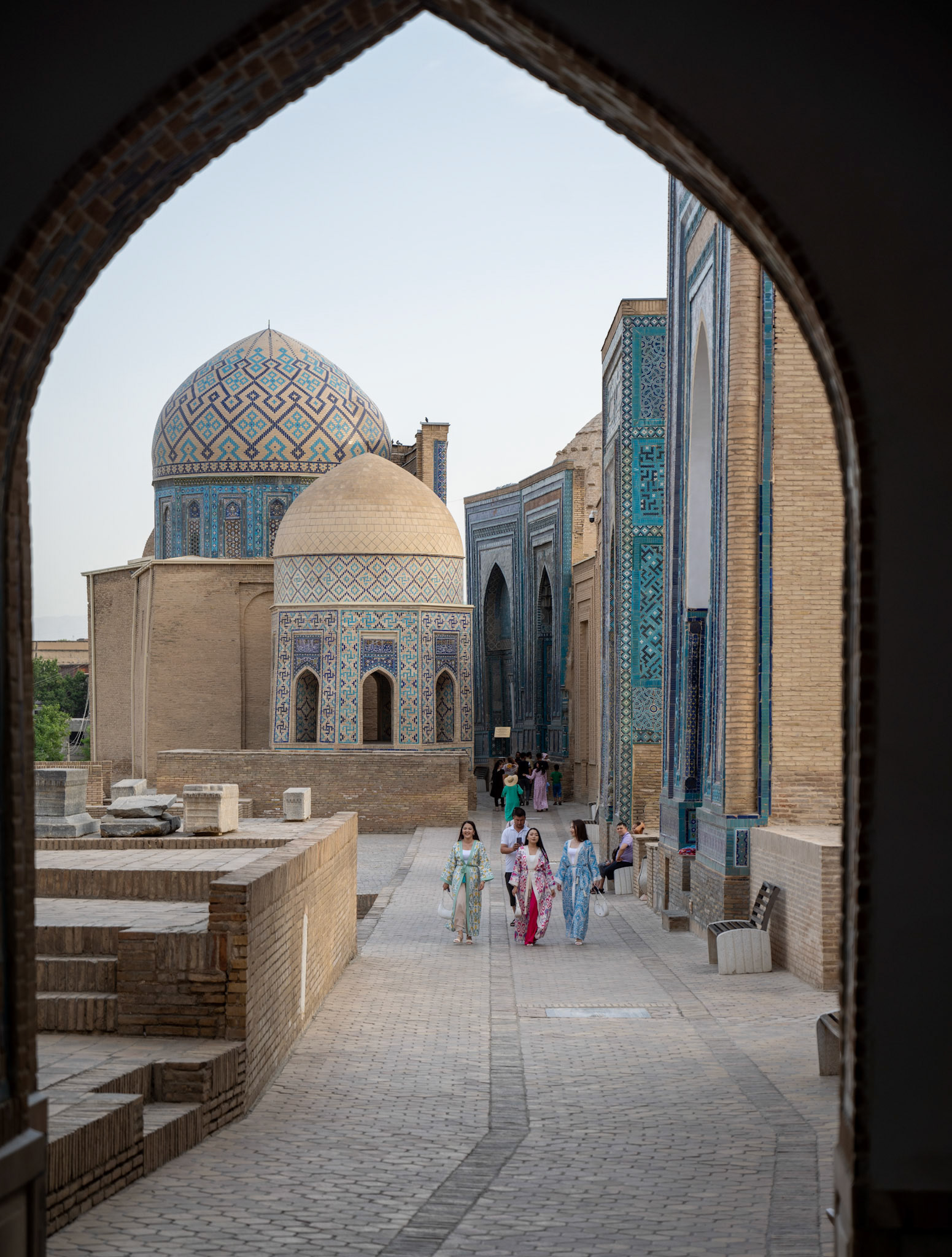 Shah-i-Zinda. Rows of blue tombs and various mausoleums grouped along a narrow avenue