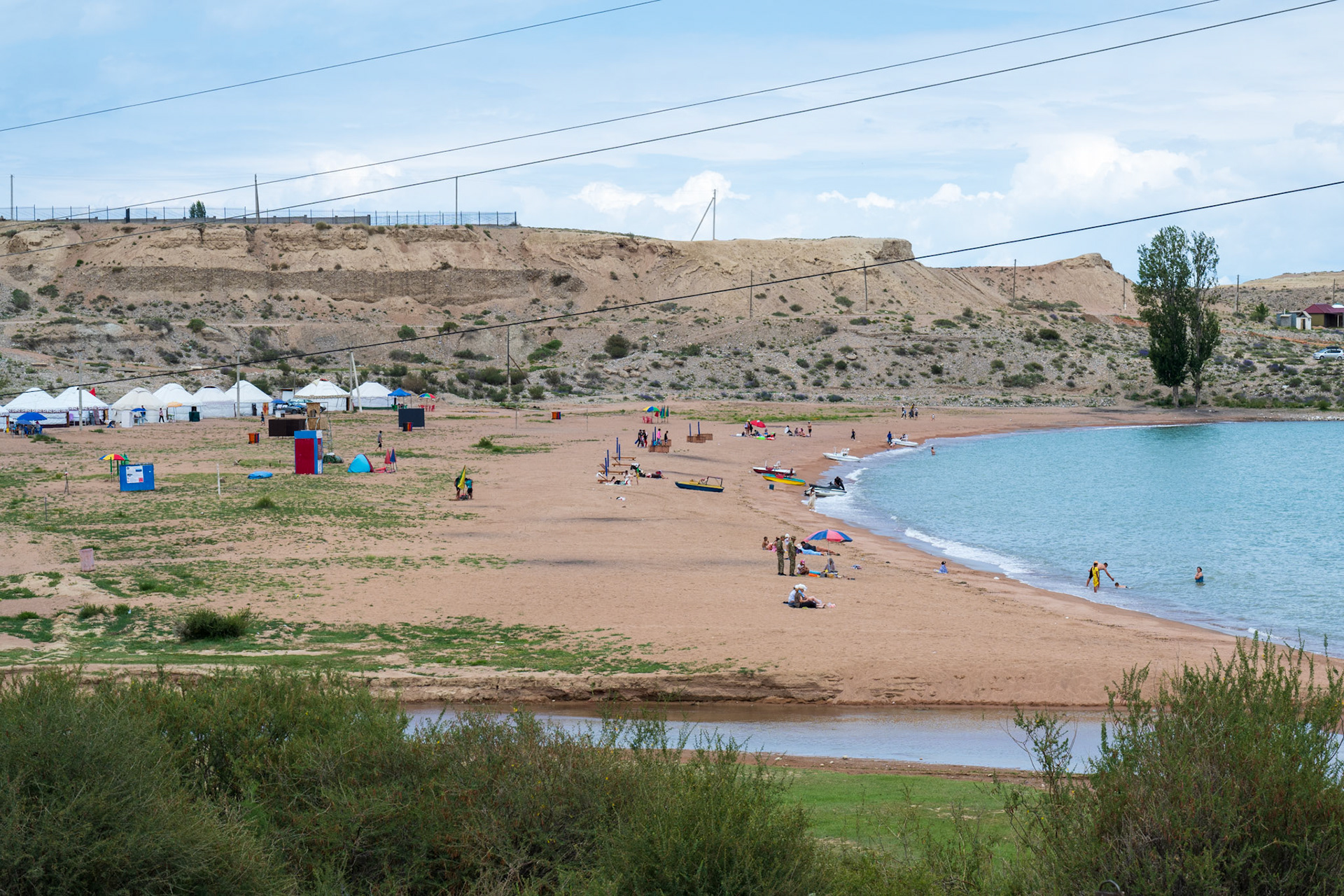 The Issyk-Kul's beaches cannot yet compete with the French Riviera but I find the idea of yurts on a beach very funny!