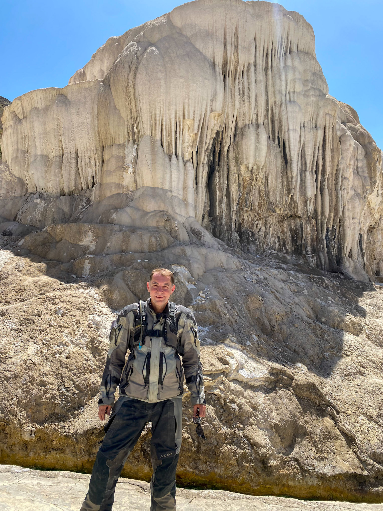 Dirk in front of Garam Chashma, the most renowned open-air hot spring in the Pamirs