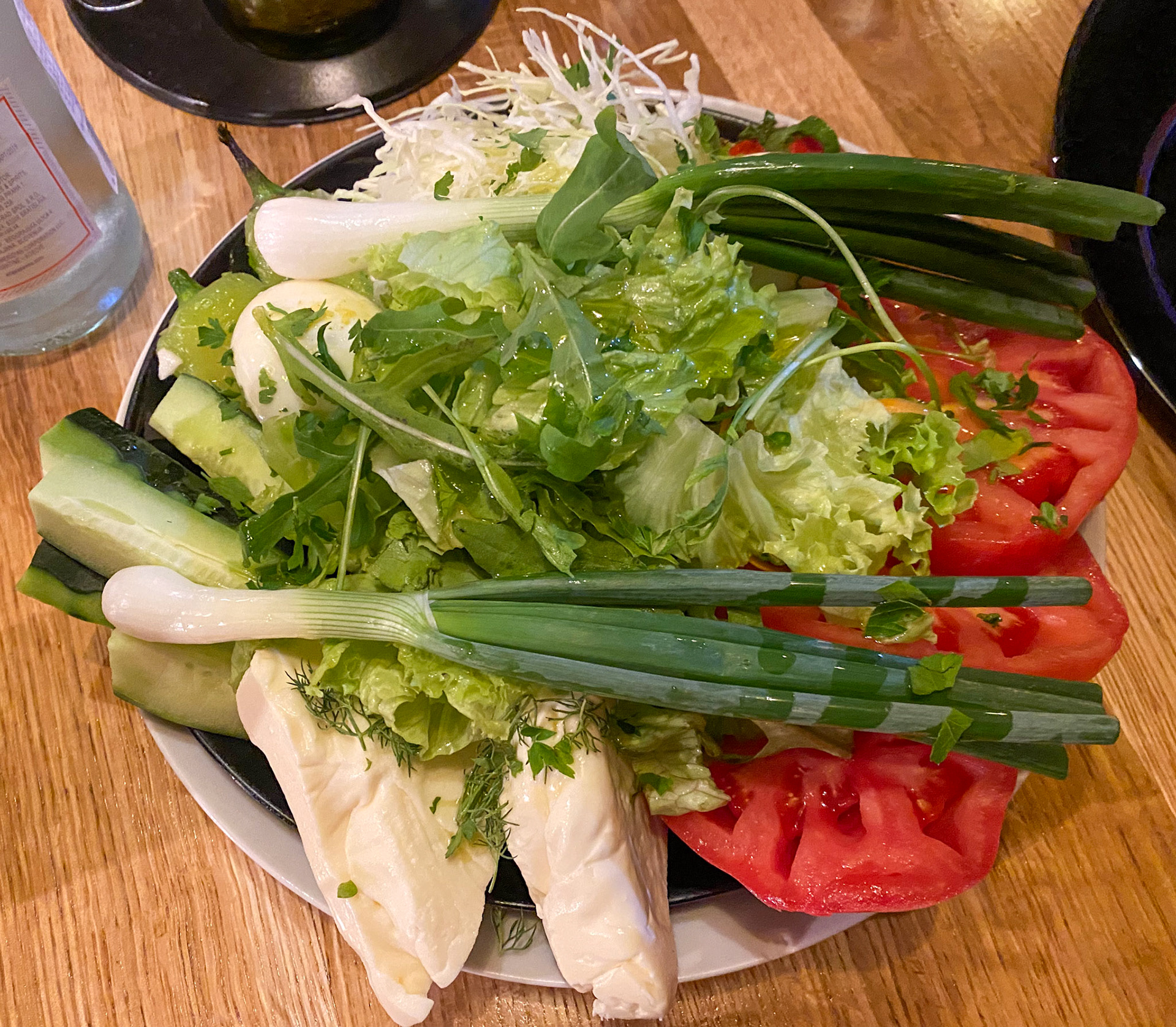 A typical dinner for us in Pristina would be a rough salad (i.e. vegetables whole or cut in large pieces) and then a plate of assorted grilled meats