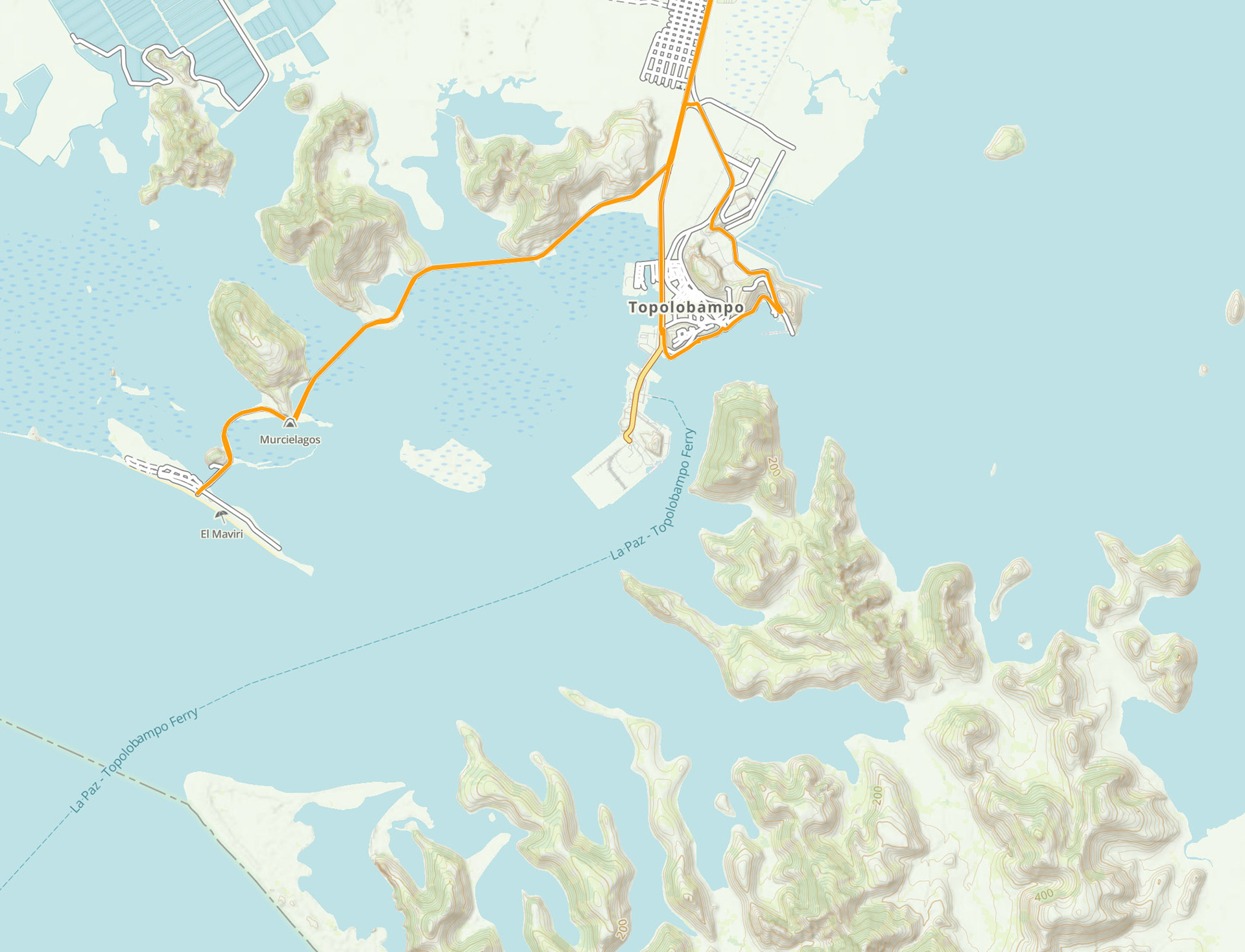 When we get to Topolobambo it’s a bit disappointing as it’s a huge harbor and refineries site. Still, the view on the island and the old town is nice. We decide to take some of those bridges (more like levees) and arrive at the island El Maviri Beach.