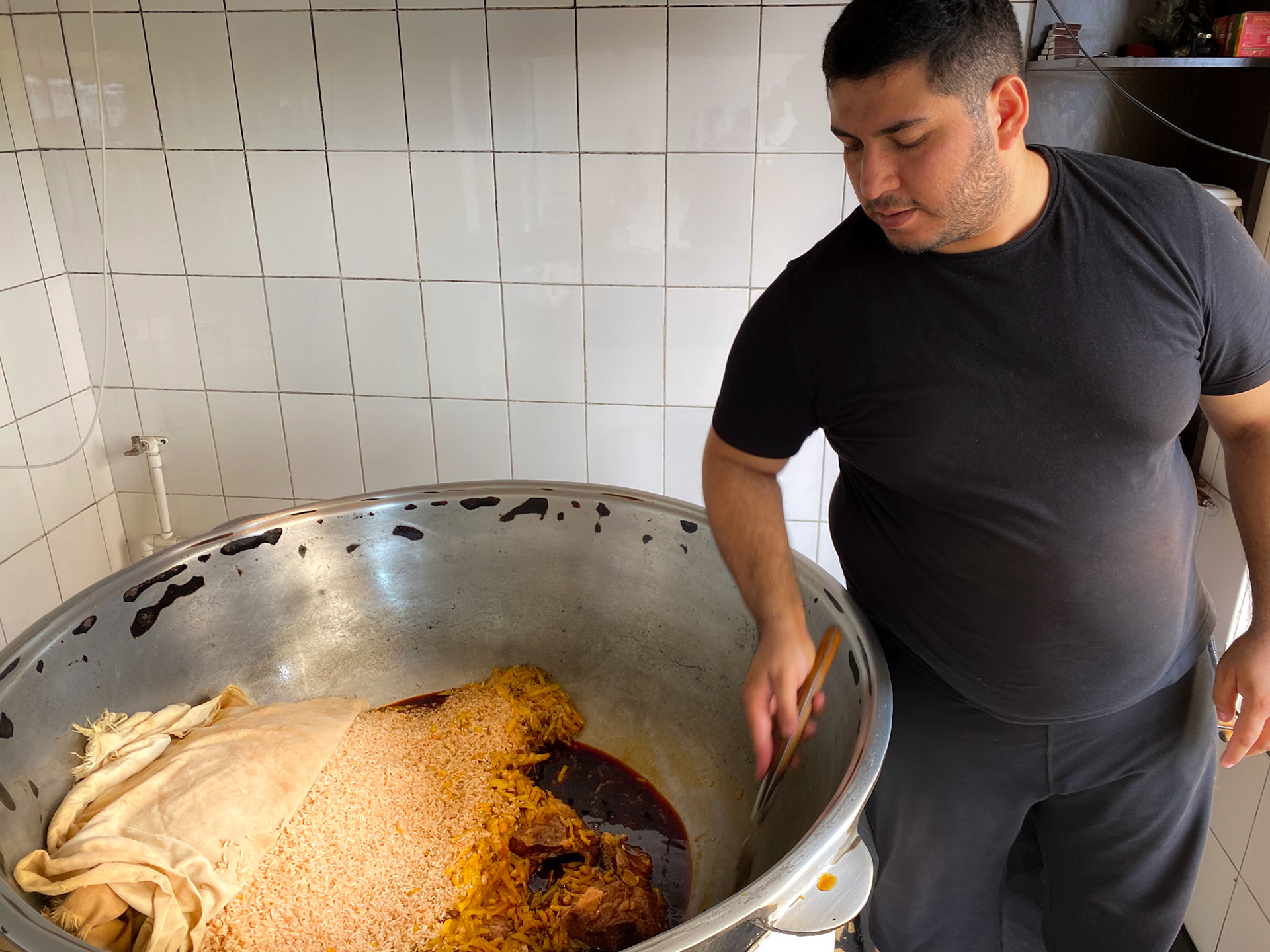 Aziz invites us to eat plov, and that's how it's made