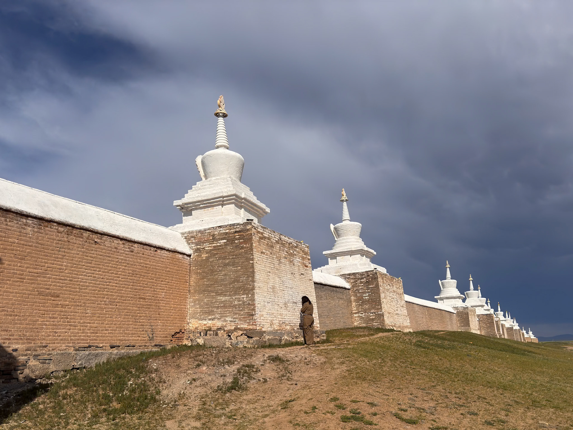 The walls are about 7 meters high and are topped with 108 stupas, a number significant in Buddhism