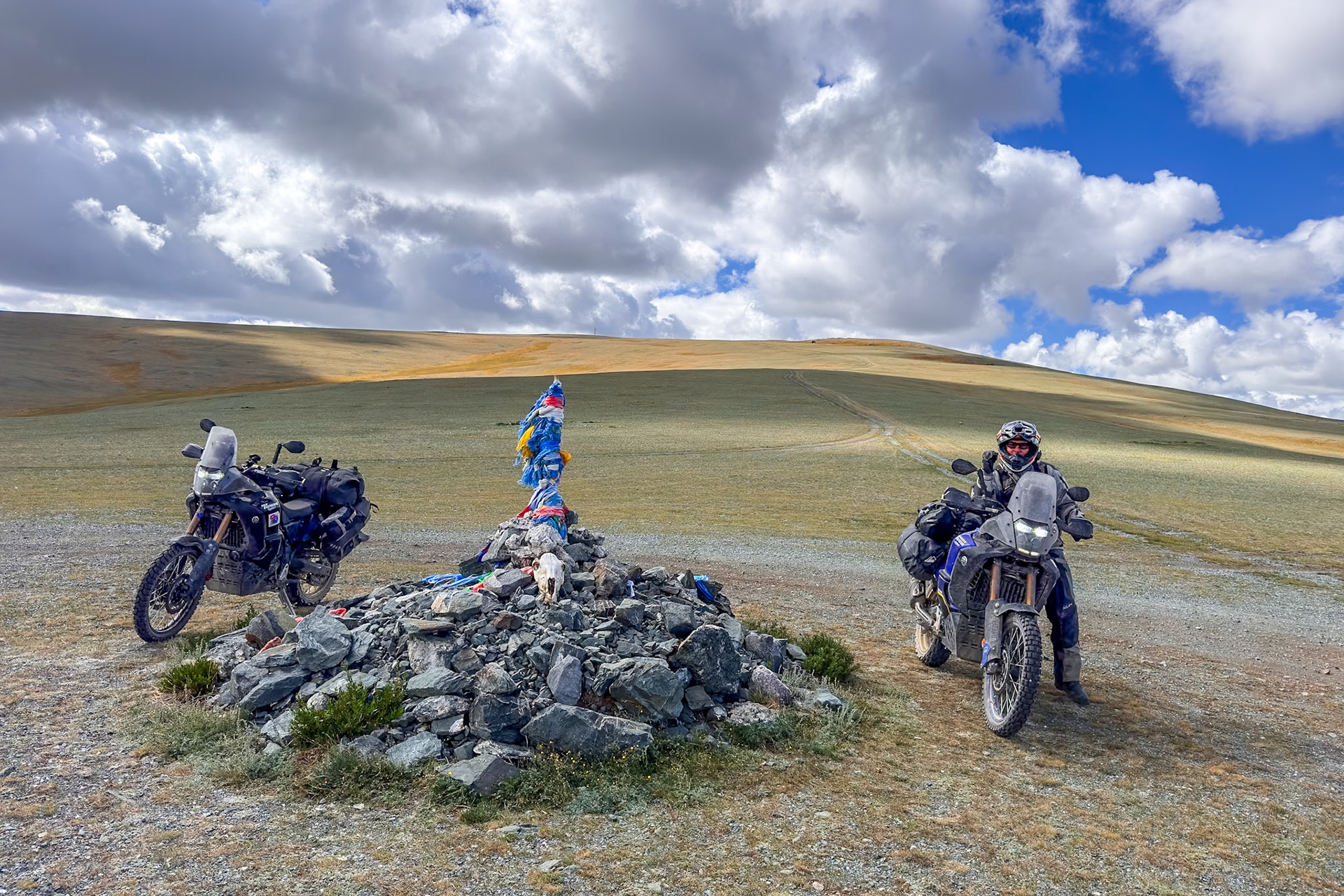 An ovoo, a Mongolian shrine or cairn, often found in a summit, like here