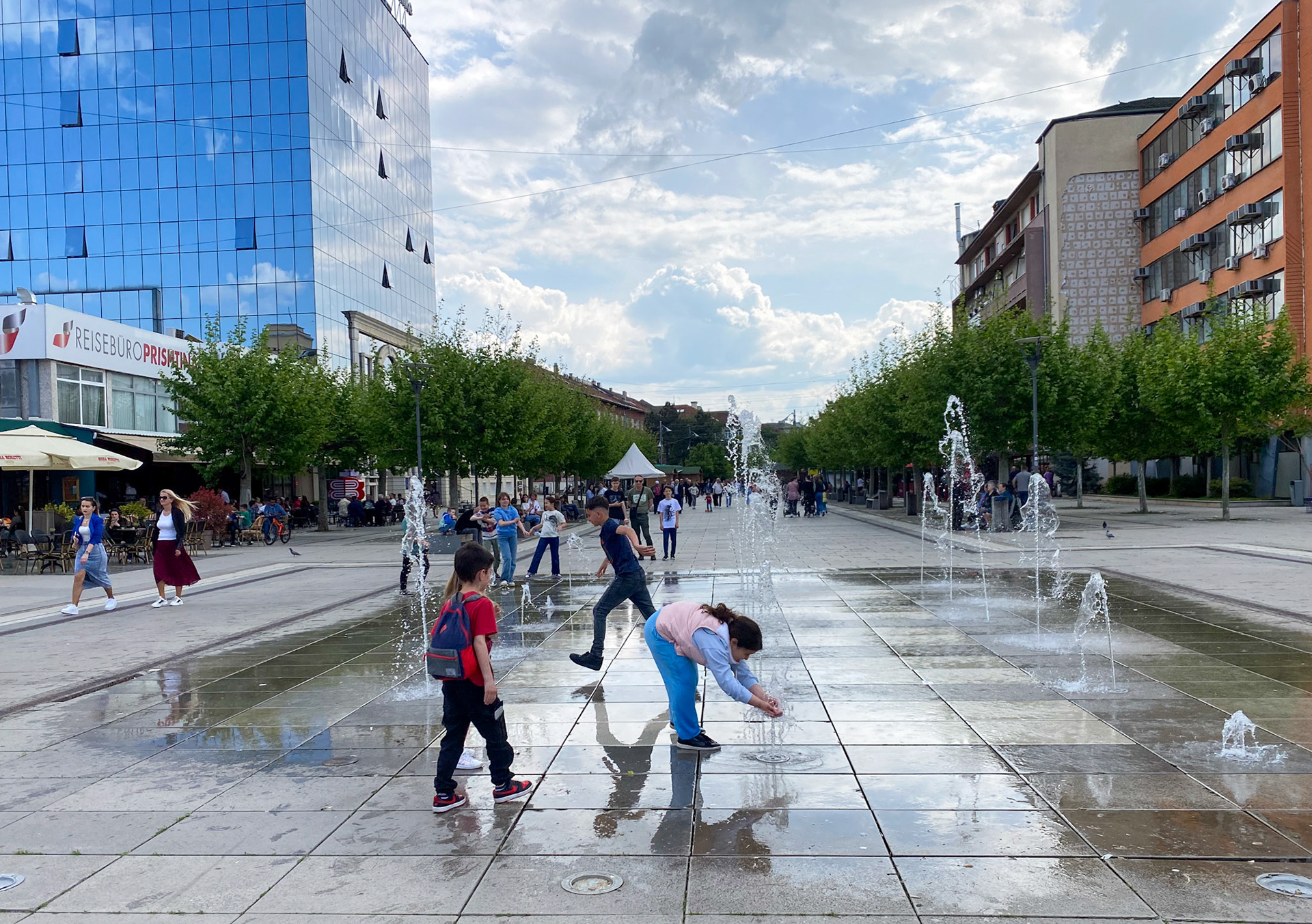 This is the end of a long pedestrian boulevard, lined up with cafés and tons of people just going by. We enjoyed it every day.
