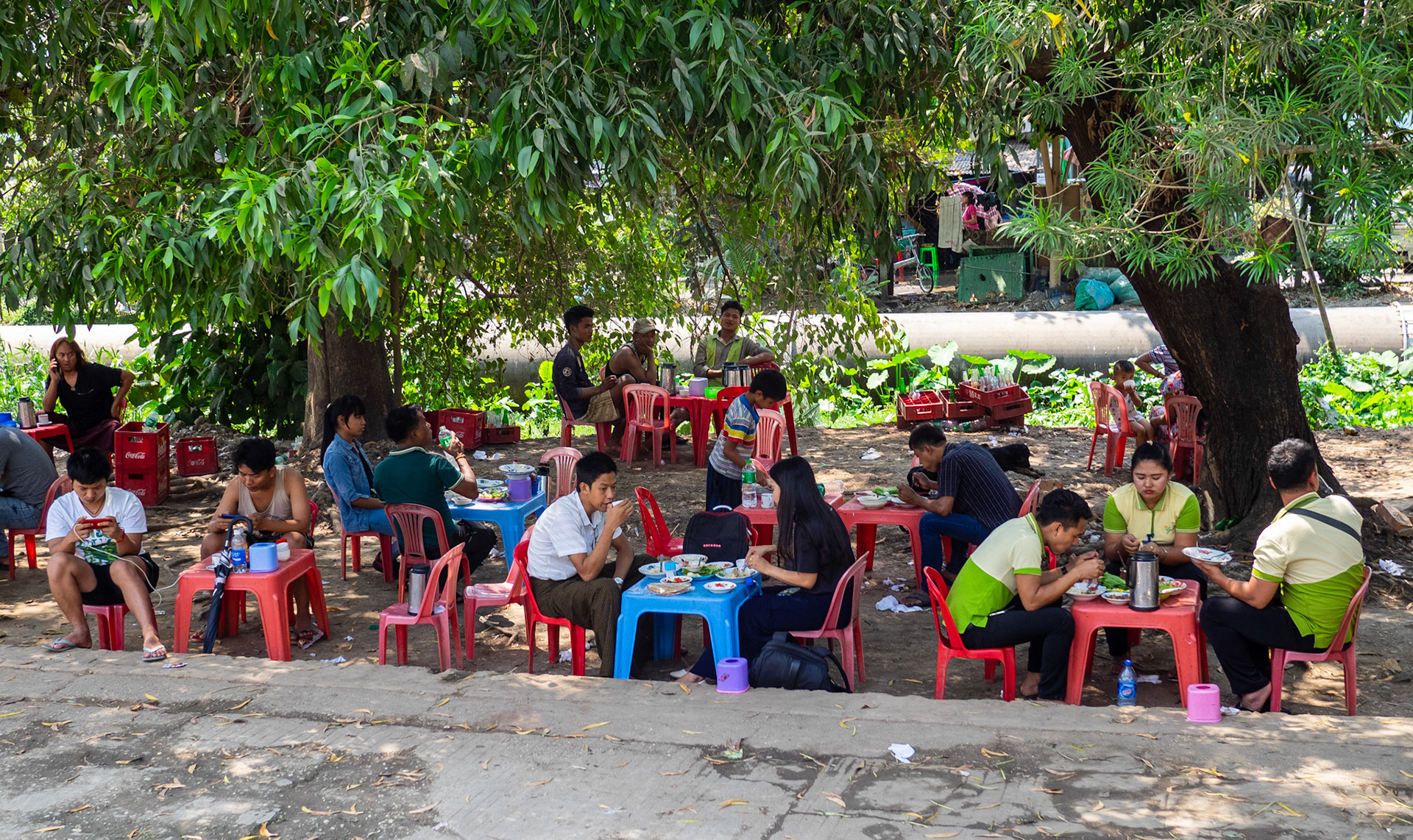 Outdoor restaurants and these small tables and chairs omnipresent here