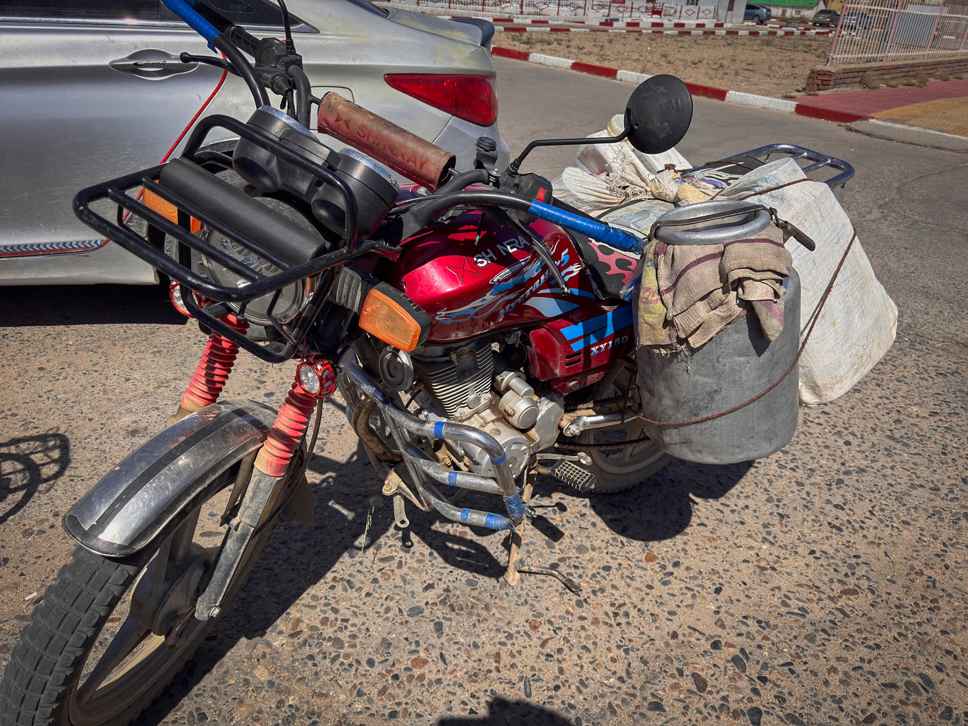 They go anywhere, carrying anything on these Chinese 150cc