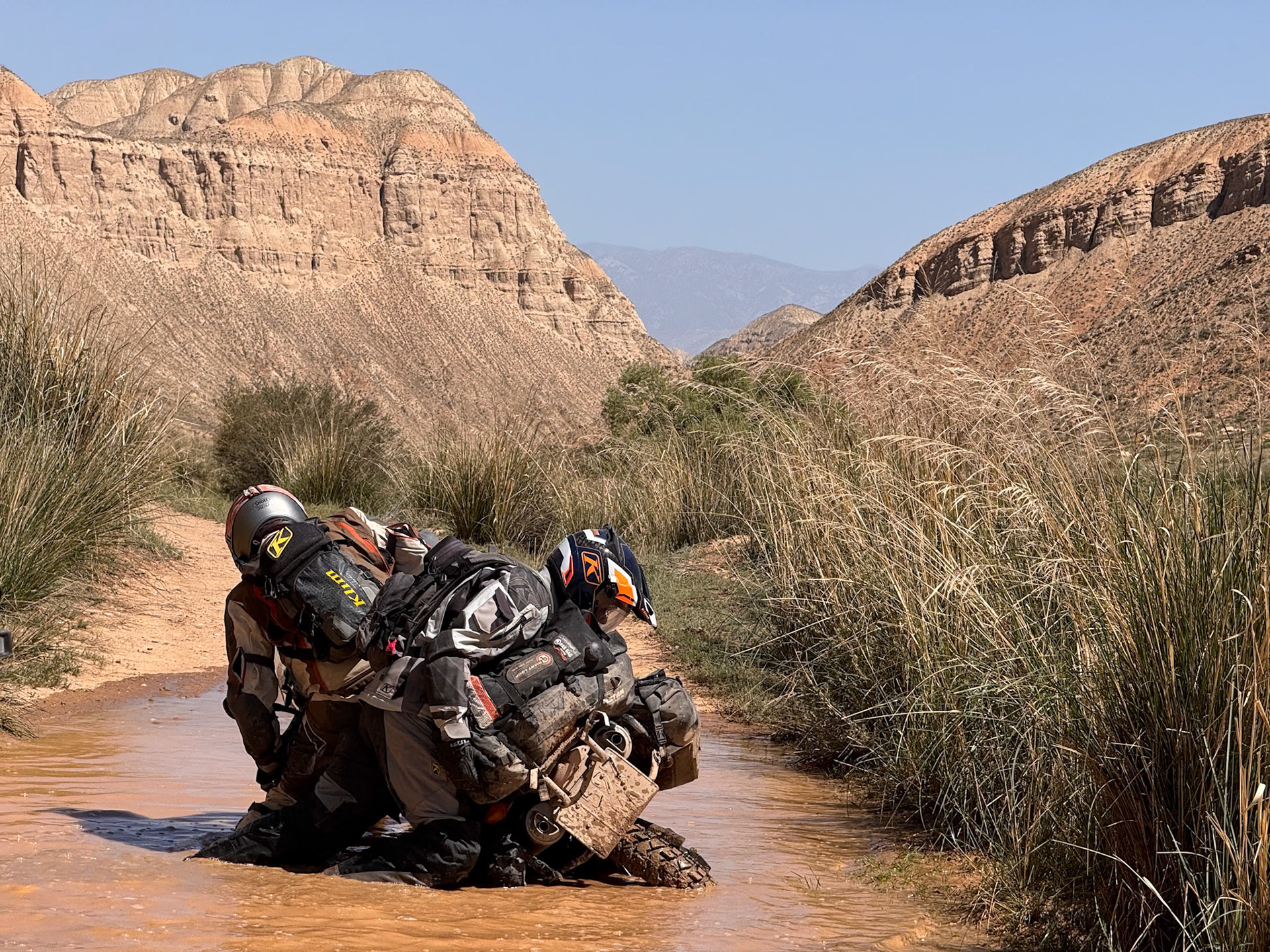 The ground was so slippery that it took all three of us to lift the bike back up.