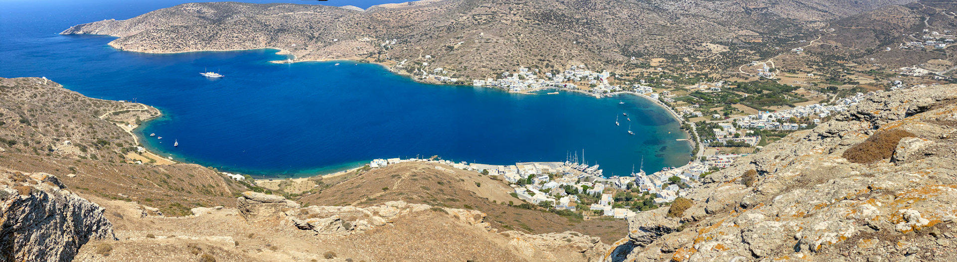The town of Katapola from the cliffs of Ancient Minoa. It was one of the most important centers of human life and activity on Amorgos throughout prehistoric times and was originally the summer residence of Cretan king Minos.