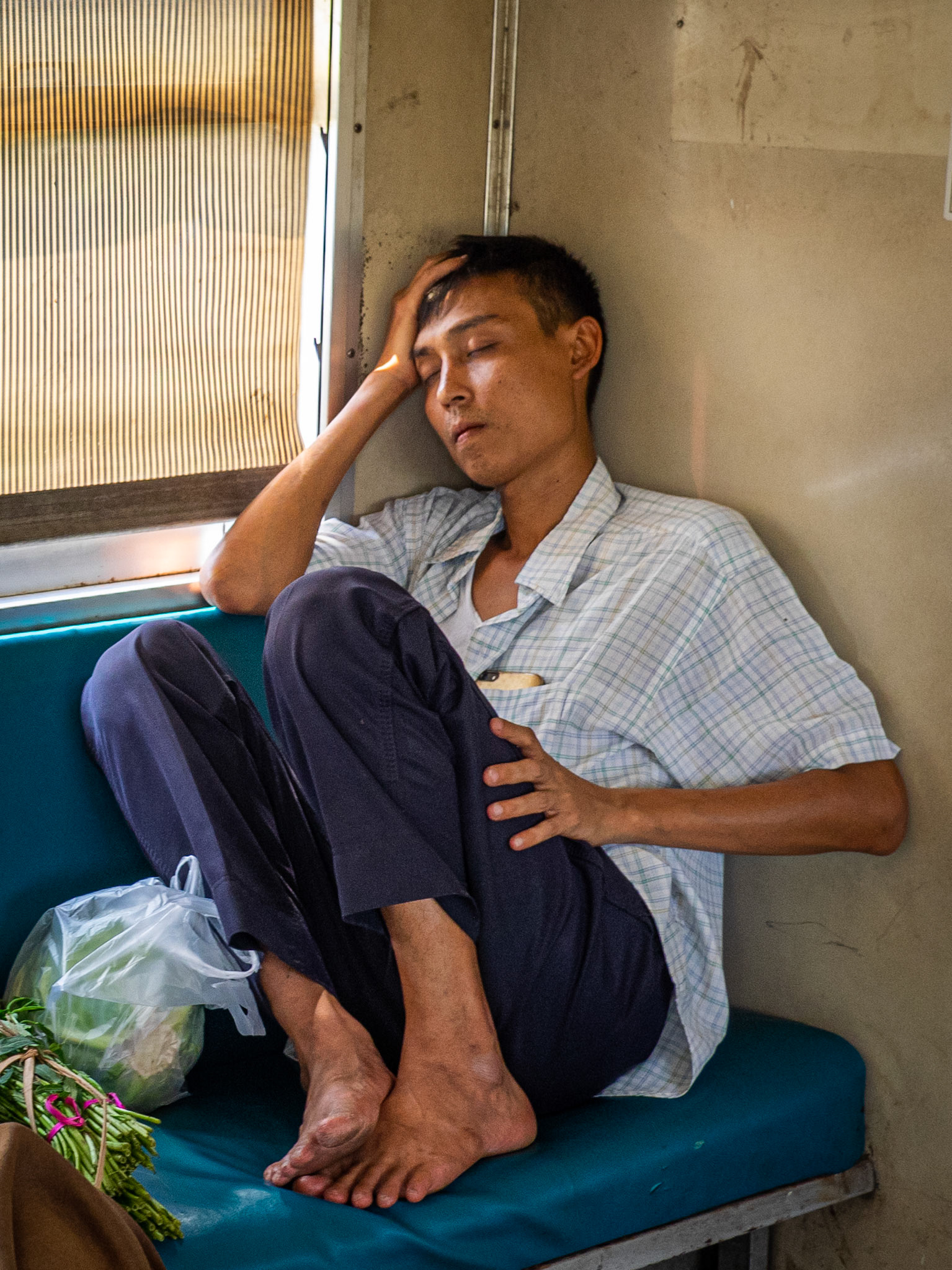 It’s hot, travel is slow, even the train driver takes a nap