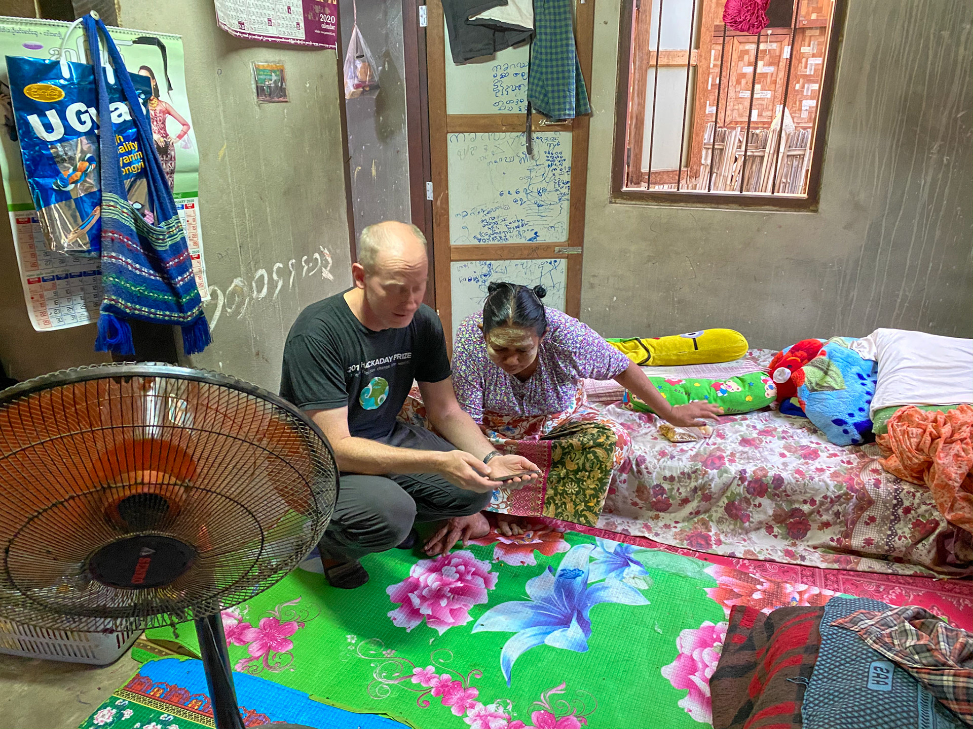 When there is a language barrier, pictures always help. Andy showing pictures of ATZ to her mother, from his previous visit.