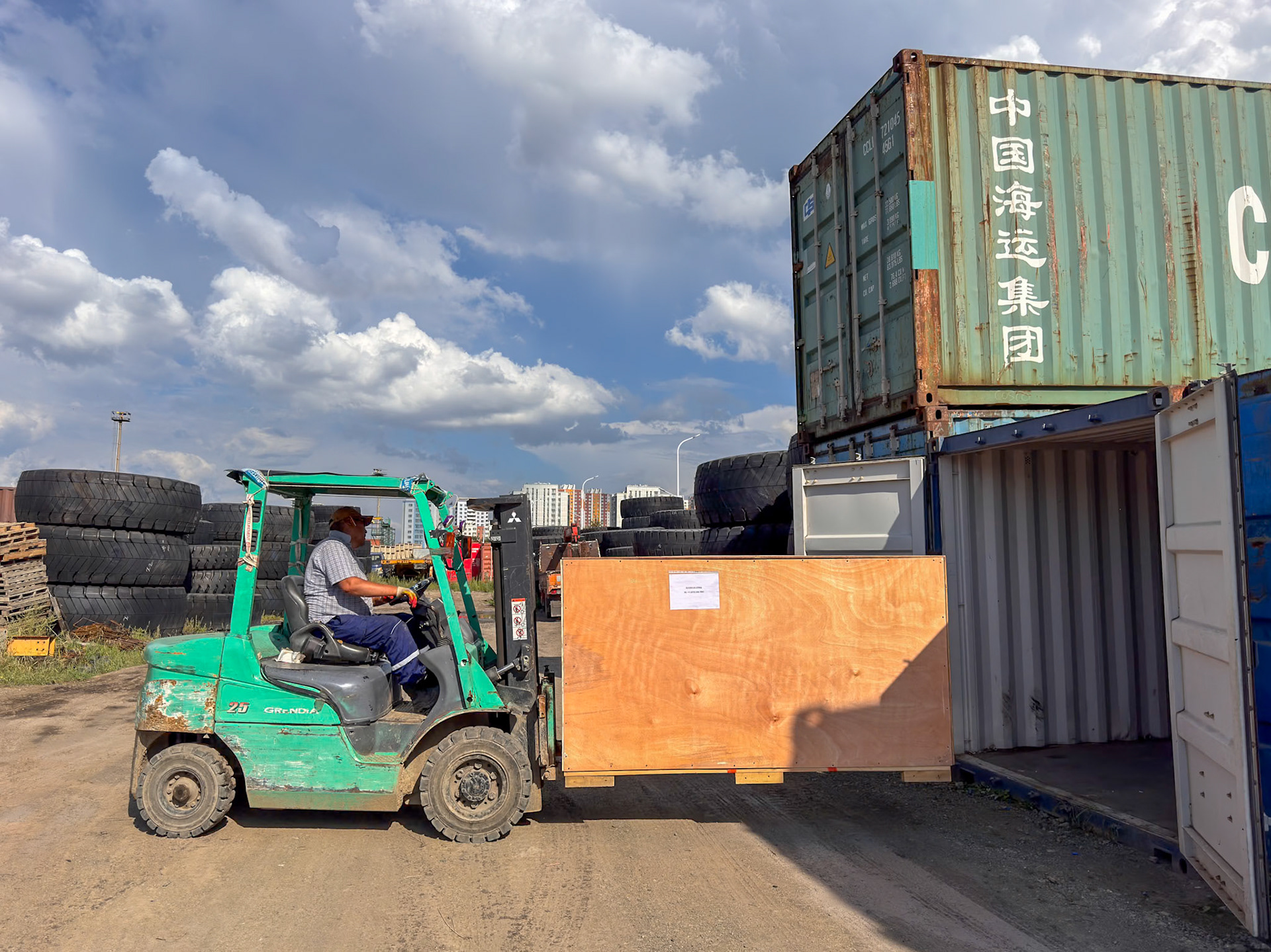 Our 2 motorcycles will wait in this container for more travelers' bikes