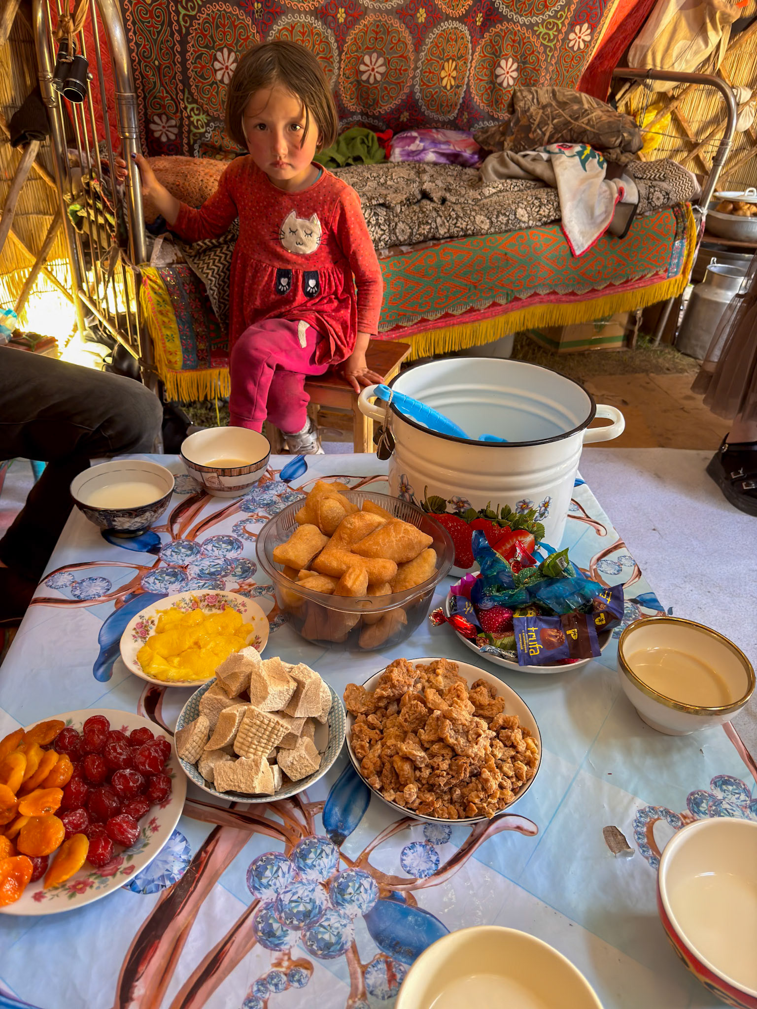 One of the 5 children with that great spread of food. What generosity!!