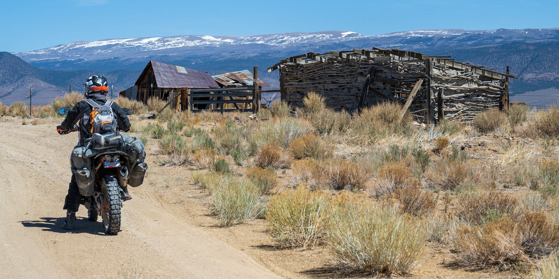 An old corral and a shelter built with adobe and branches