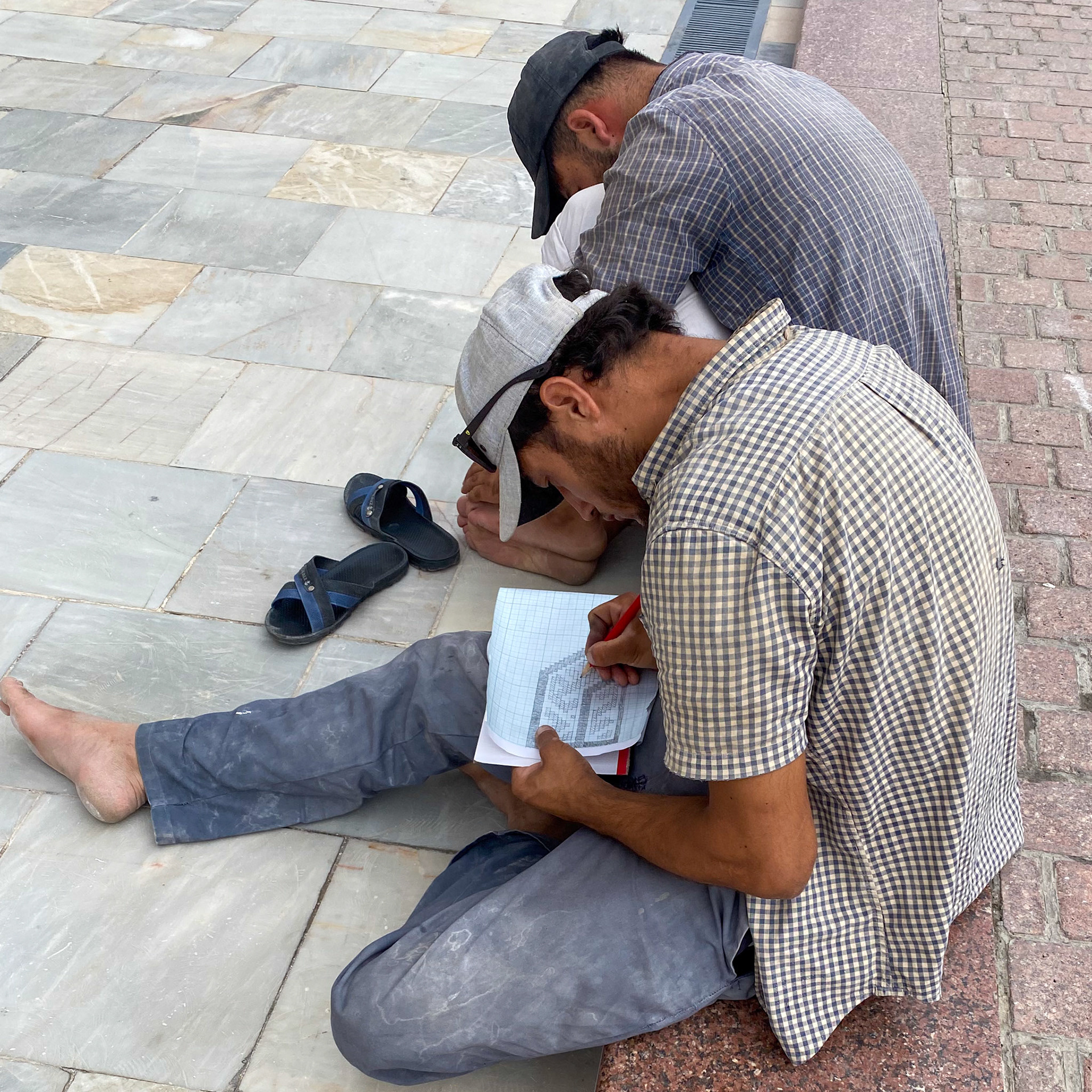 Workers for the continuous upkeep of the edifices. No computer assistance here