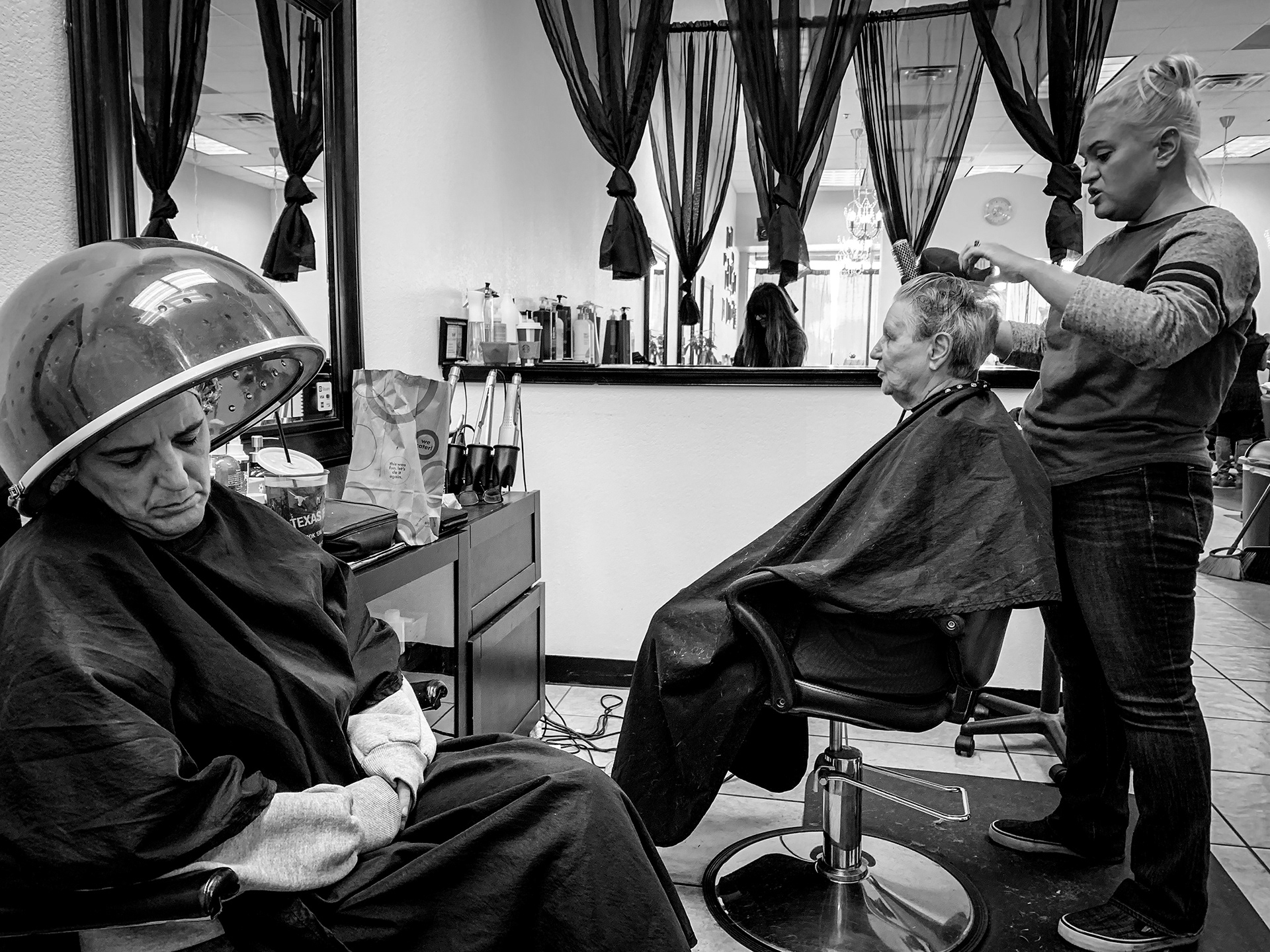 Framed print - 2018 - At The Hair Salon - Honorable mention/Photo Journalism - Mobile Photography Awards