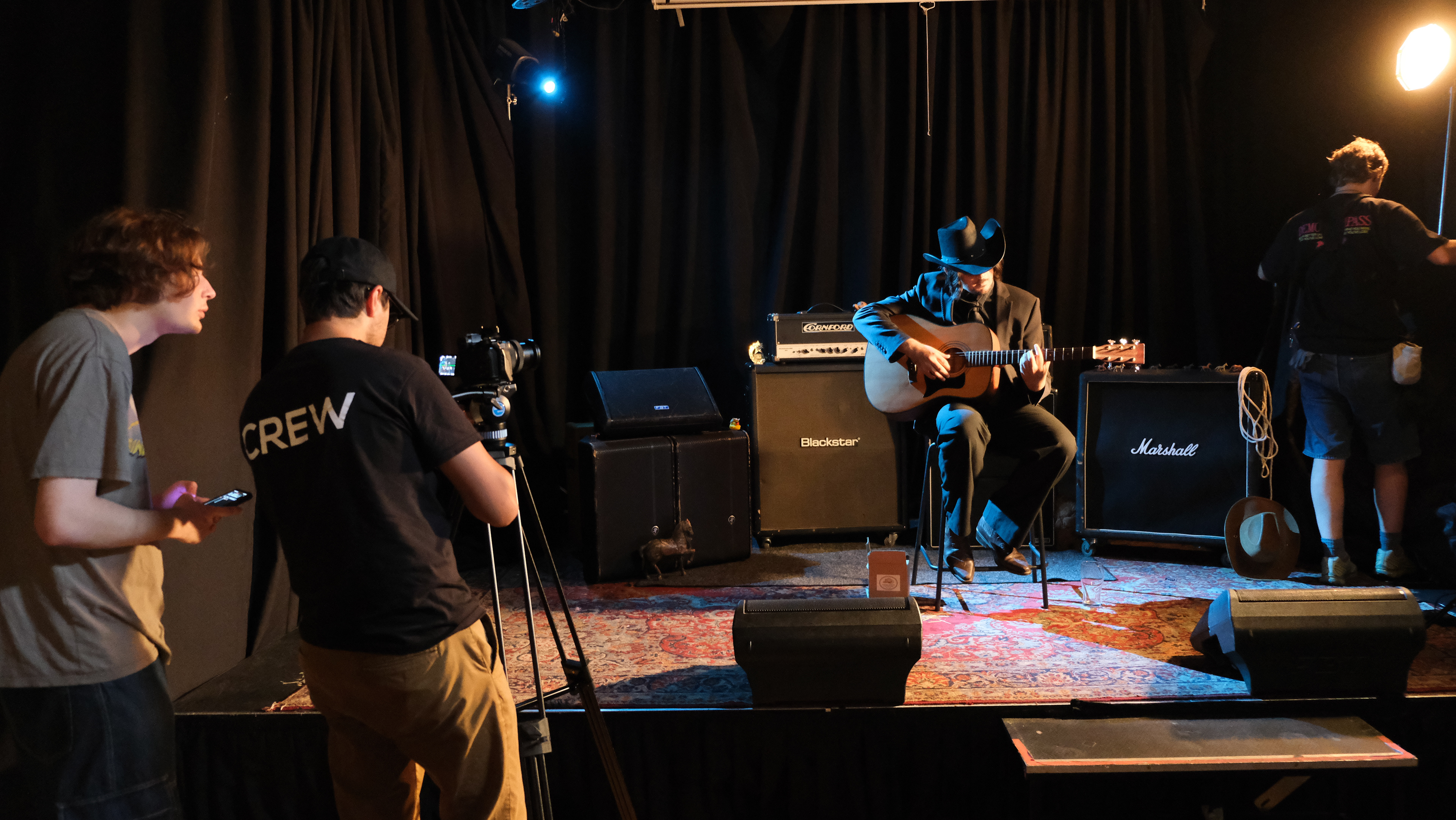 Director (Second from left) Setting up