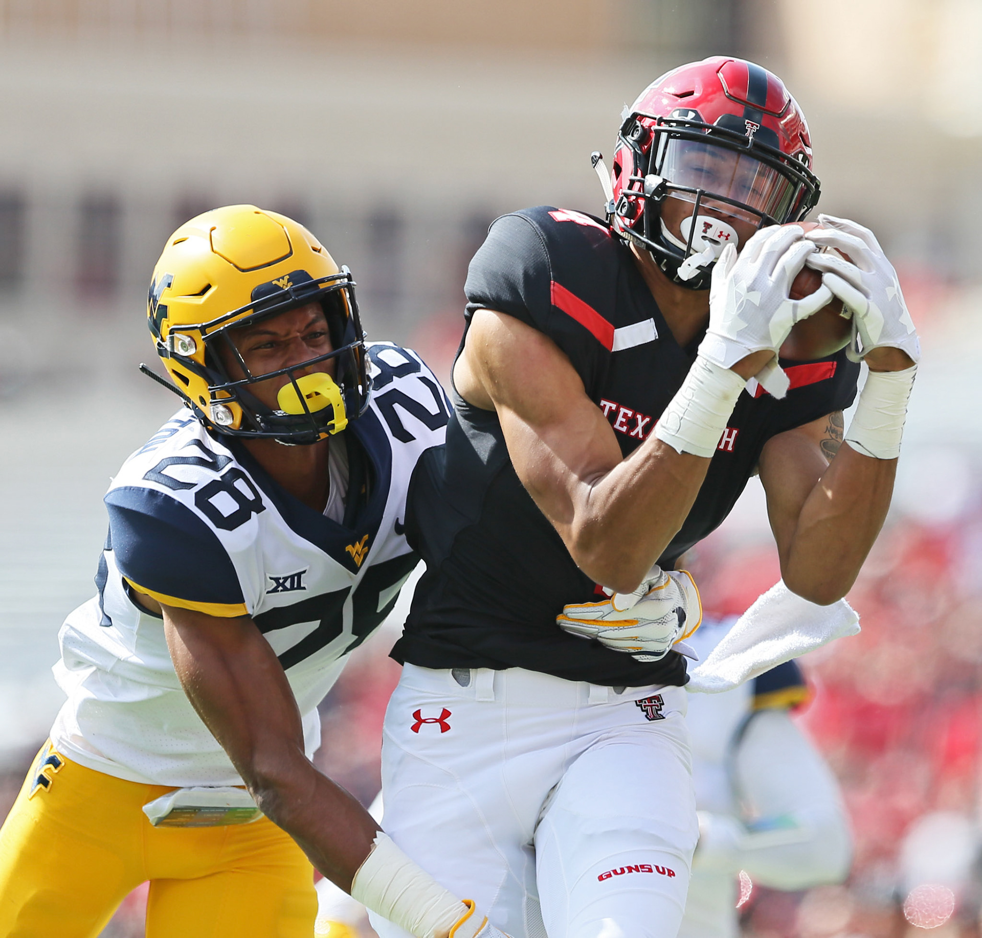 Texas Tech's Antoine Wesley (4) scores a touchdown during game against West Virginia Saturday, Sept. 29, 2018, at Jones AT&amp;T Stadium in Lubbock, Texas. [Sam Grenadier/A-J Media]