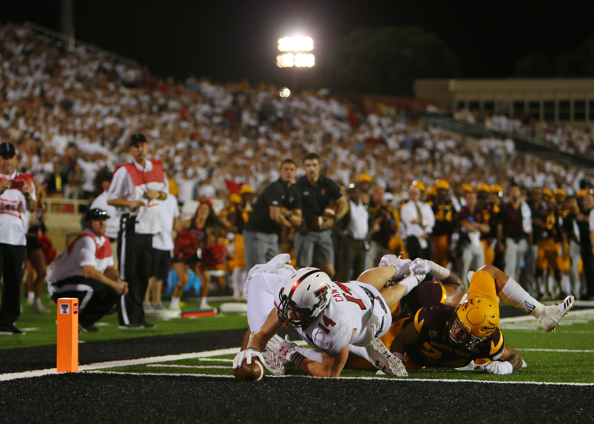 LUBBOCK, TX - SEPTEMBER 16: Texas Tech wide receiver Dylan Cantrell (14) scores the game winning touchdown during the Texas Tech Raider's 52-45 victory over the Arizona State Sun Devils on September 16, 2017 at Jones AT&amp;T Stadium in Lubbock, TX. (Photo by Sam Grenadier/Icon Sportswire)