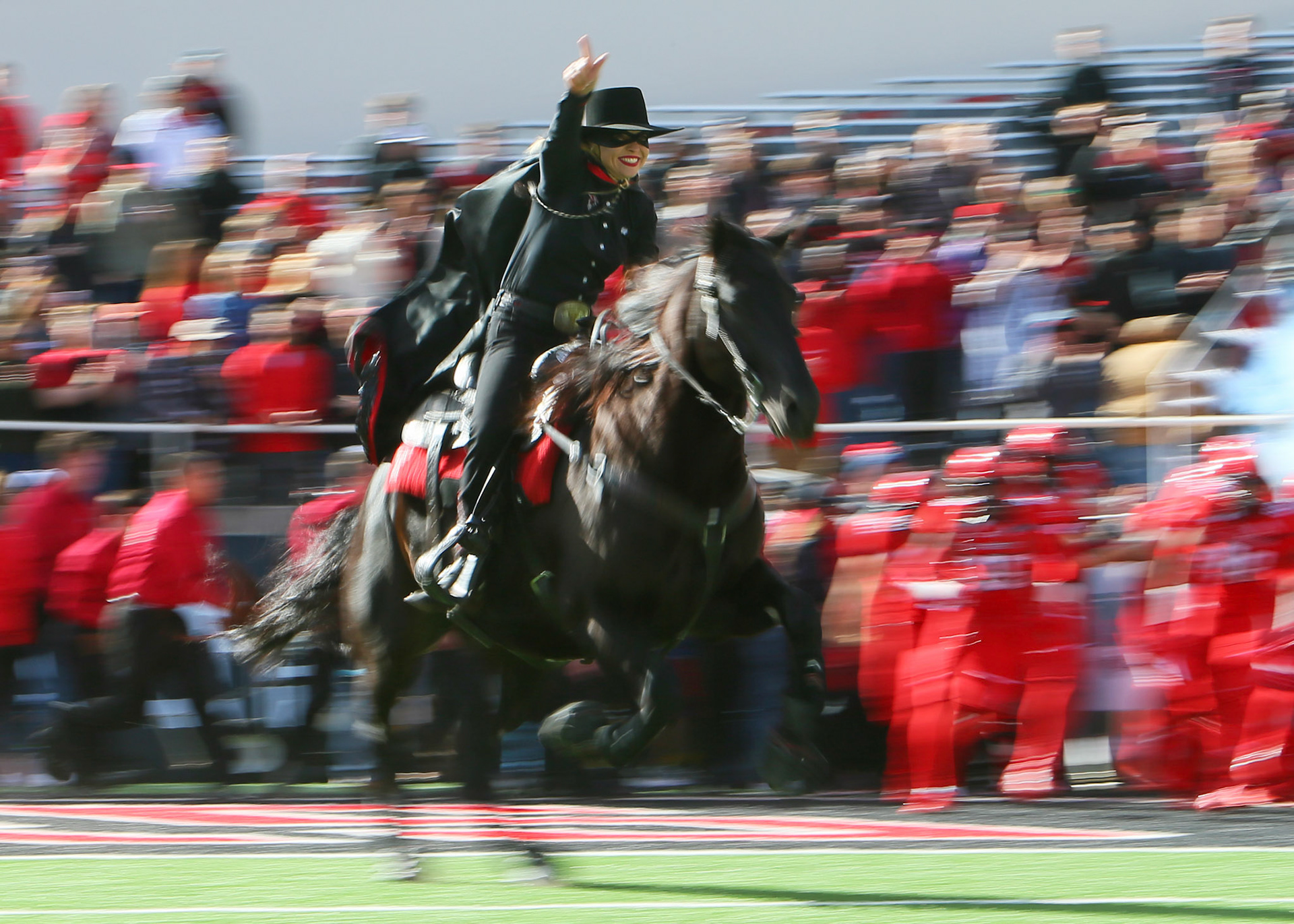 LUBBOCK, TX - NOVEMBER 18: The Masked Rider runs across the field before the Texas Tech Raider's 27-3 loss to the Texas Christian University Horned Frogs on November 18, 2017 at Jones AT&amp;T Stadium in Lubbock, TX. (Photo by Sam Grenadier/Icon Sportswire)
