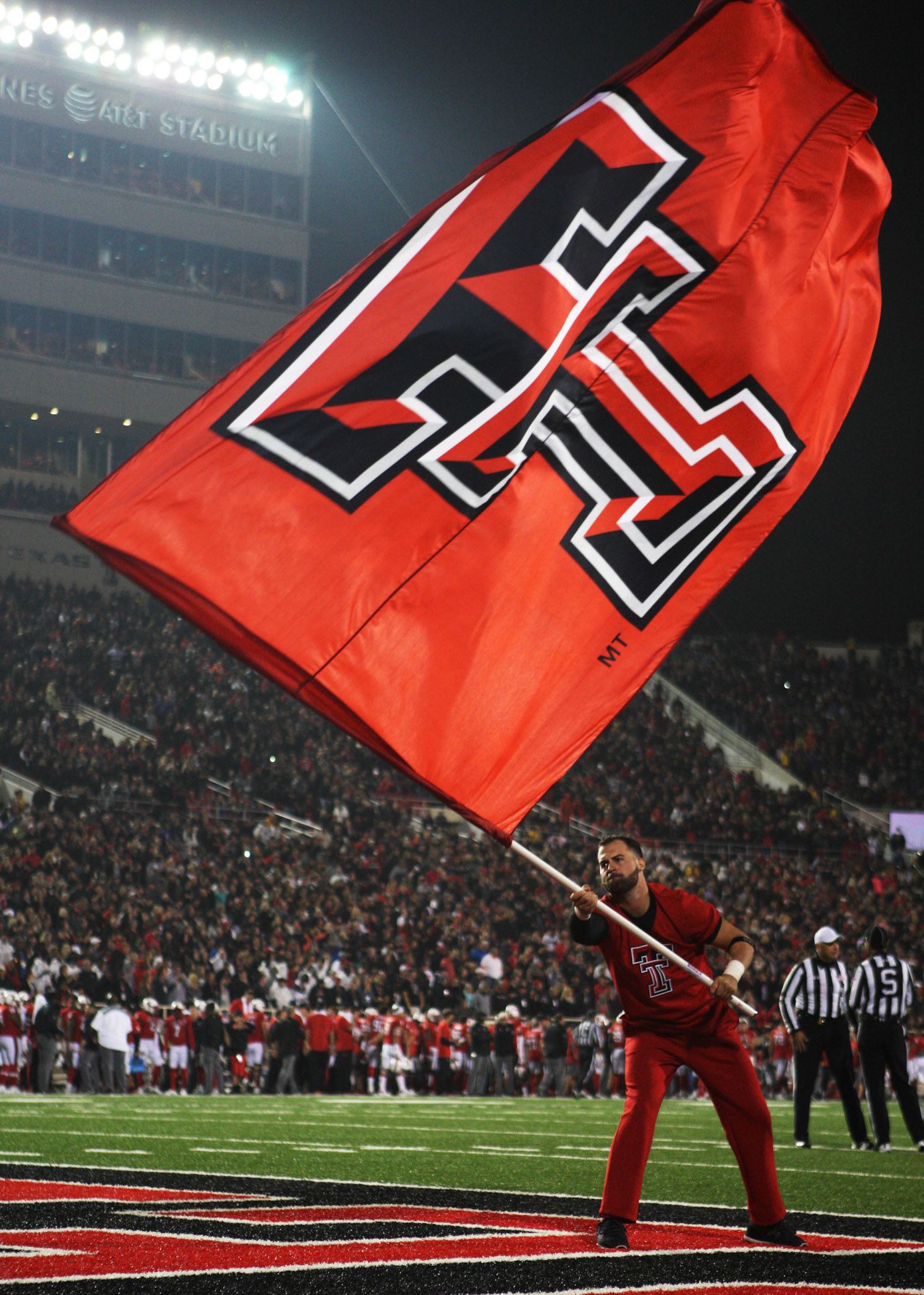 LUBBOCK, TX - SEPTEMBER 30: A Texas Tech cheerleader waves the a Double T flag after a touchdown during the Texas Tech Raider's 41-34 loss to the Oklahoma State Cowboys on September 30, 2017 at Jones AT&amp;T Stadium in Lubbock, TX. (Photo by Sam Grenadier/Icon Sportswire)