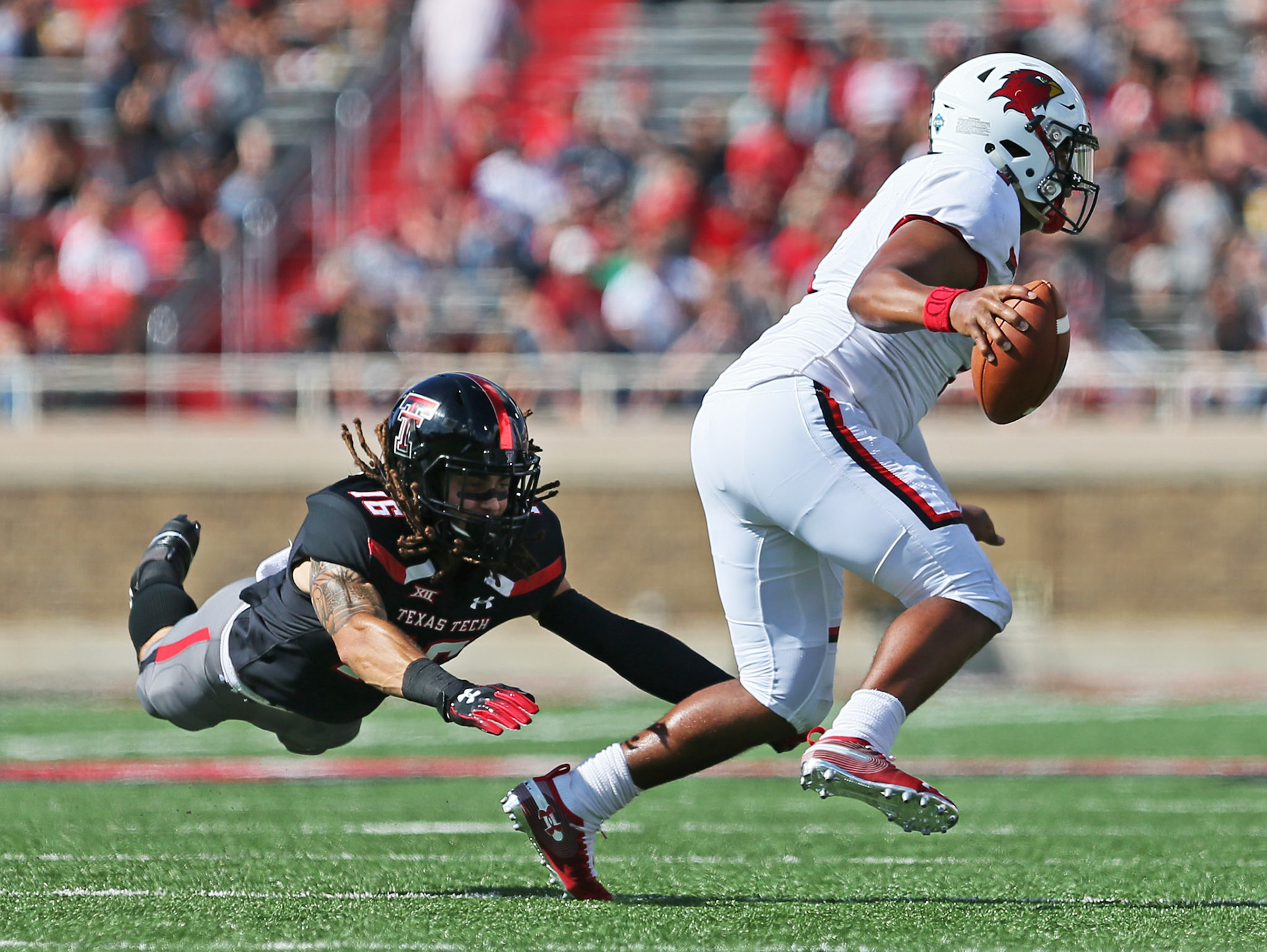 Texas Tech's Thomas Leggett attempts a tackle during the game against Lamar, Saturday, Sept. 8, 2018, at Jones AT&amp;T Stadium in Lubbock, Texas. [Sam Grenadier/A-J Media]