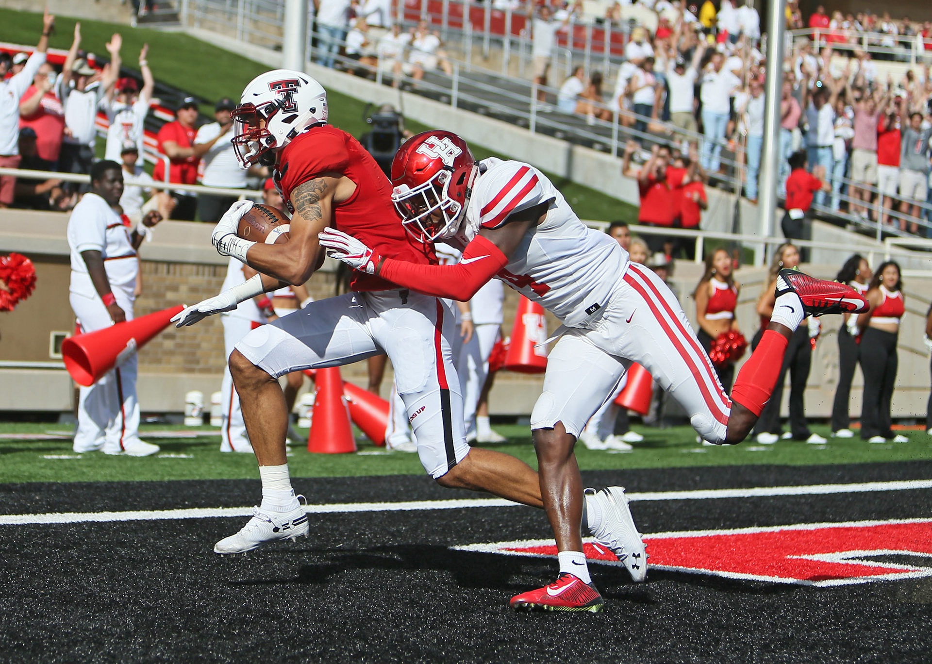 Texas Tech's Antoine Wesley (4) scores a touchdown during game against Houston Saturday, Sept. 15, 2018, at Jones AT&amp;T Stadium in Lubbock, Texas. [Sam Grenadier/A-J Media]
