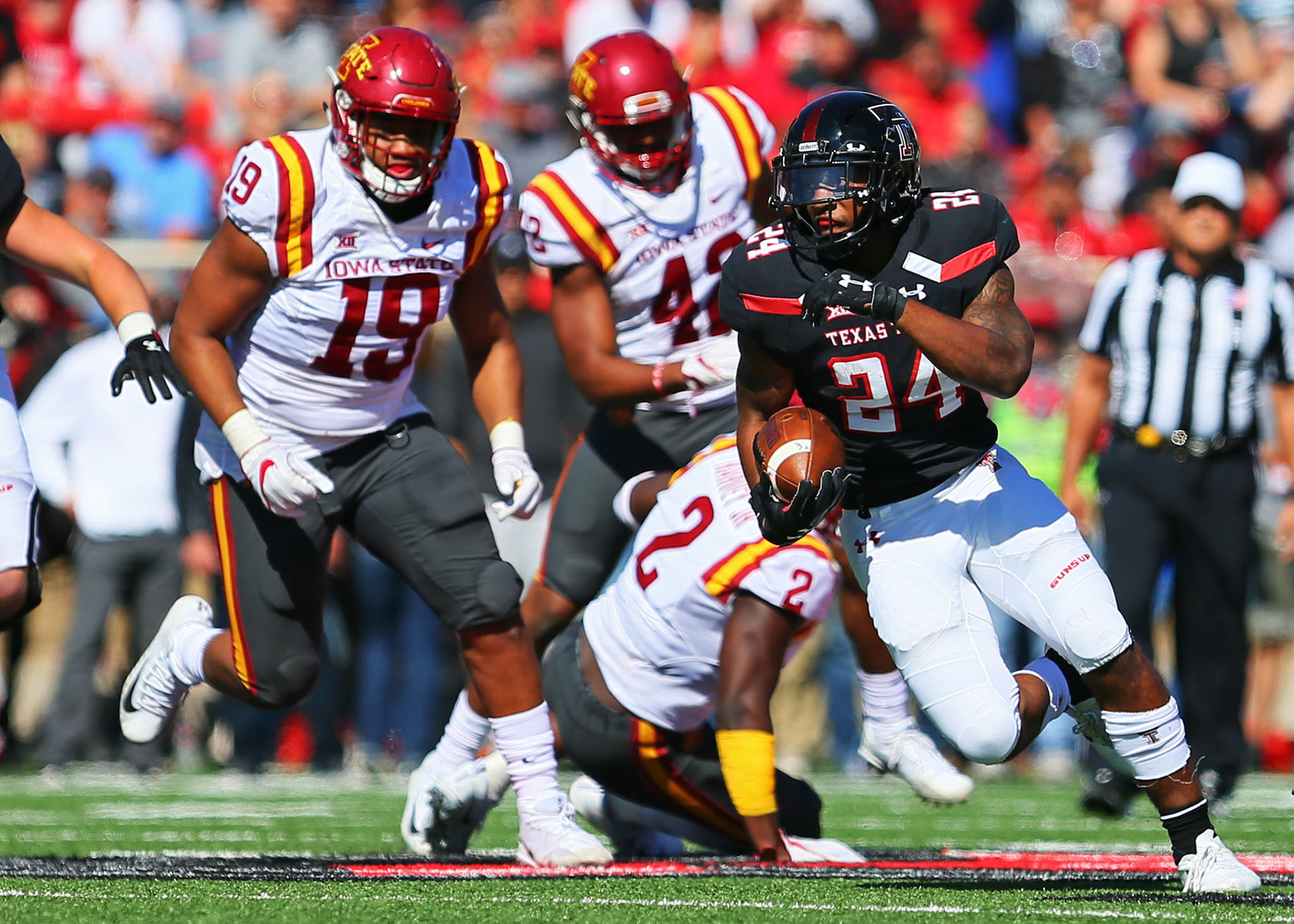 LUBBOCK, TX - October 21: Texas Tech running back Tre King (24) runs downfield during the Texas Tech Raider's 31-13 loss to the Iowa State Cyclones on October 21, 2017 at Jones AT&amp;T Stadium in Lubbock, TX. (Photo by Sam Grenadier/Icon Sportswire)