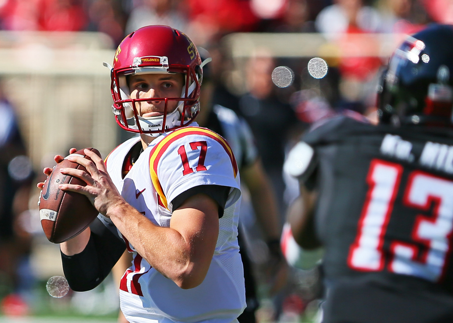 LUBBOCK, TX - October 21: Iowa State quarterback Kyle Kempt (17) drops back to pass during the Texas Tech Raider's 31-13 loss to the Iowa State Cyclones on October 21, 2017 at Jones AT&amp;T Stadium in Lubbock, TX. (Photo by Sam Grenadier/Icon Sportswire)