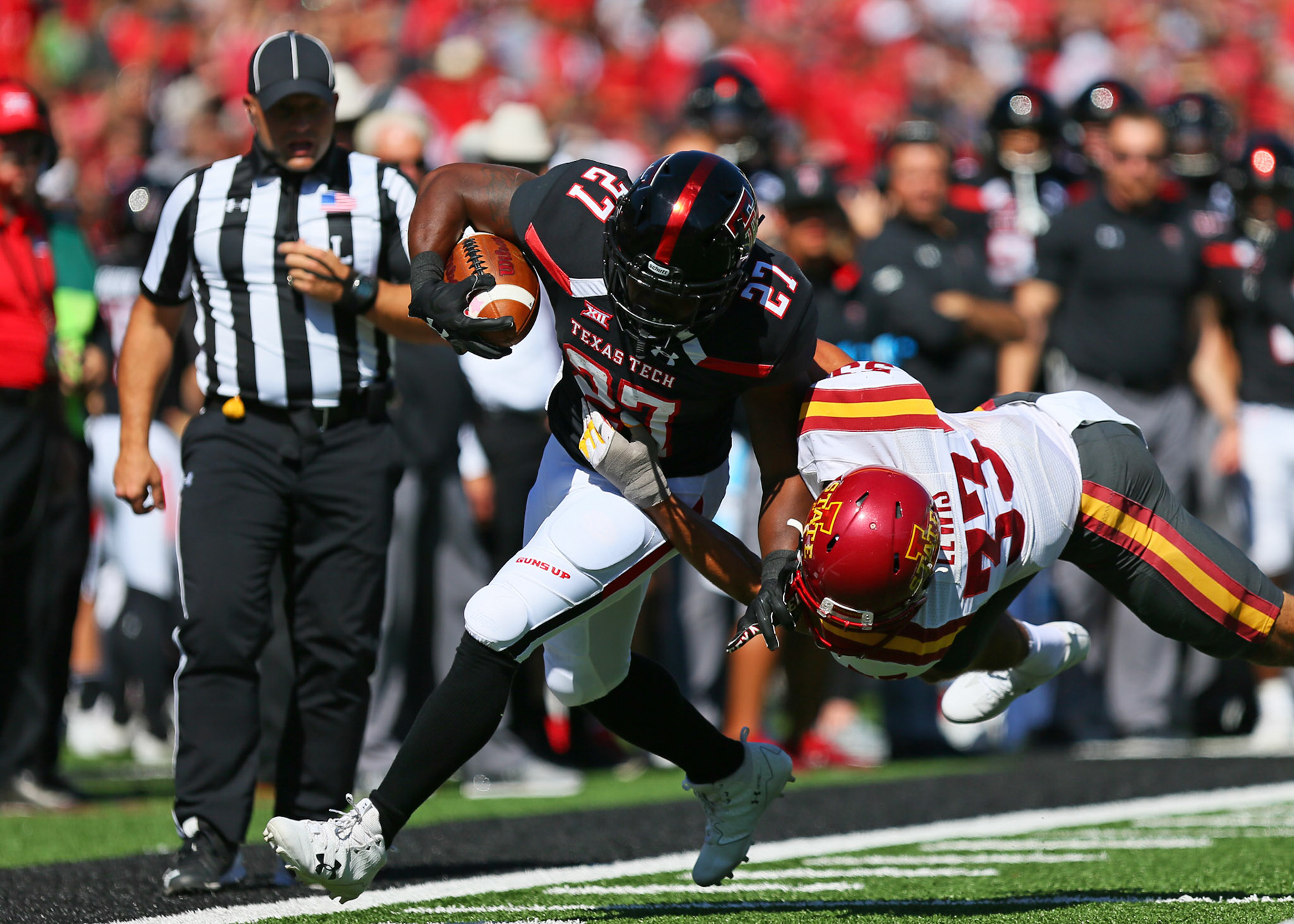 LUBBOCK, TX - October 21: Texas Tech running back Demarcus Felton (27) is tackled during the Texas Tech Raider's 31-13 loss to the Iowa State Cyclones on October 21, 2017 at Jones AT&amp;T Stadium in Lubbock, TX. (Photo by Sam Grenadier/Icon Sportswire)