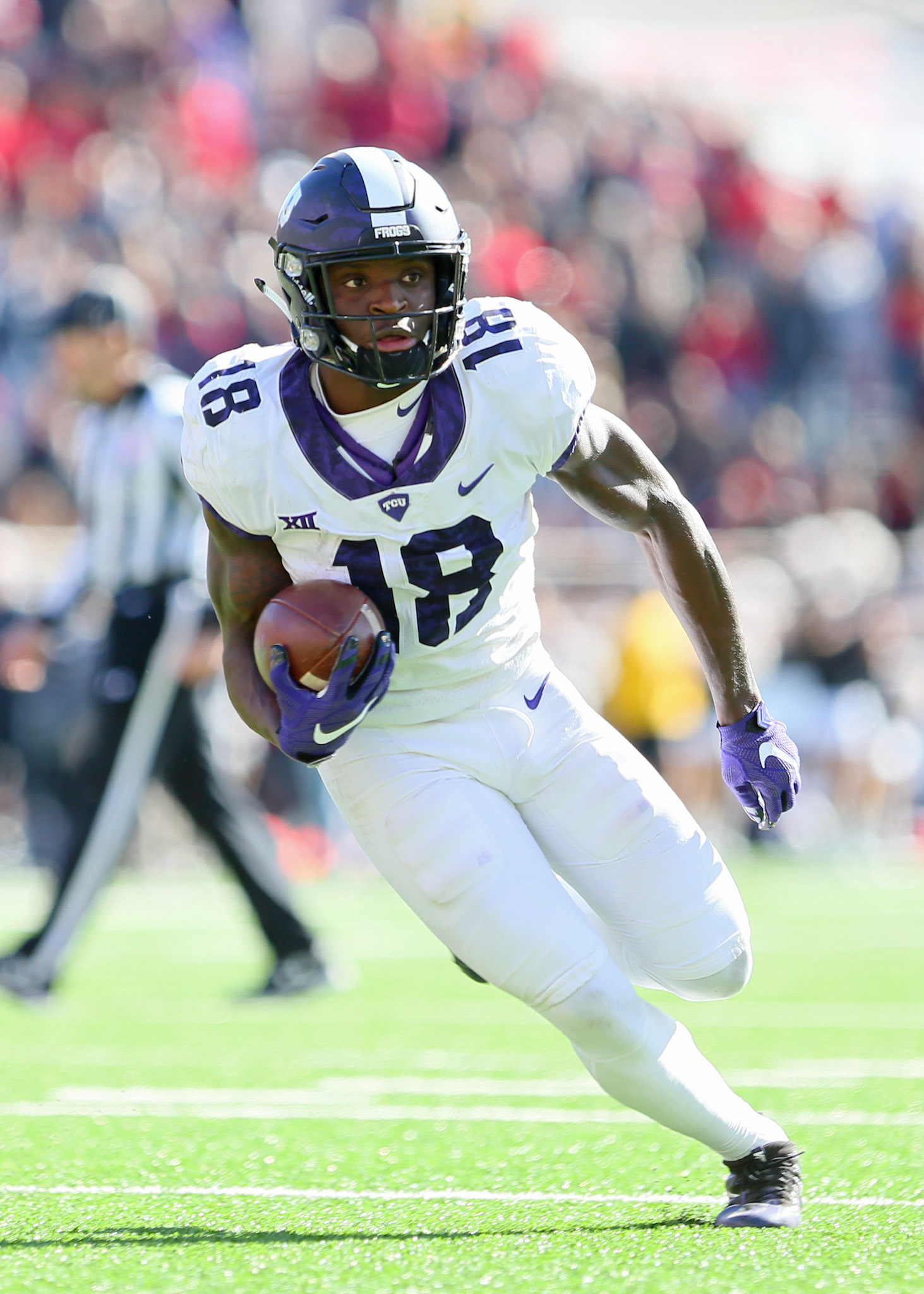 LUBBOCK, TX - NOVEMBER 18: Texas Christian wide receiver Jalen Reagor (18) runs with the ball during the Texas Tech Raider's 27-3 loss to the Texas Christian University Horned Frogs on November 18, 2017 at Jones AT&amp;T Stadium in Lubbock, TX. (Photo by Sam Grenadier/Icon Sportswire)