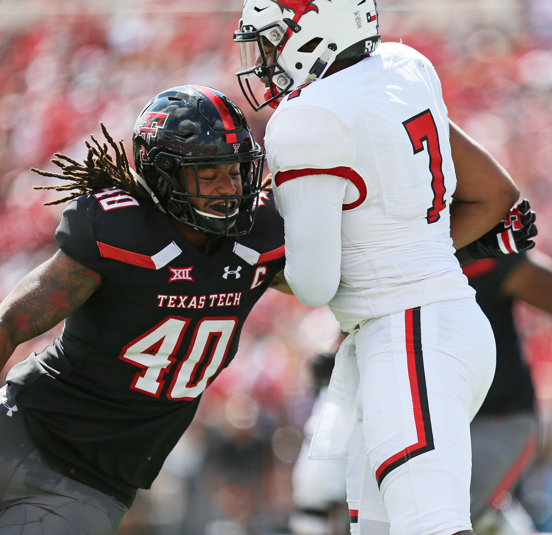 Texas Tech's Dakota Allen Tackles Lamar's Darrel Colbert Jr. during the game against Lamar, Saturday, Sept. 8, 2018, at Jones AT&amp;T Stadium in Lubbock, Texas. [Sam Grenadier/A-J Media]