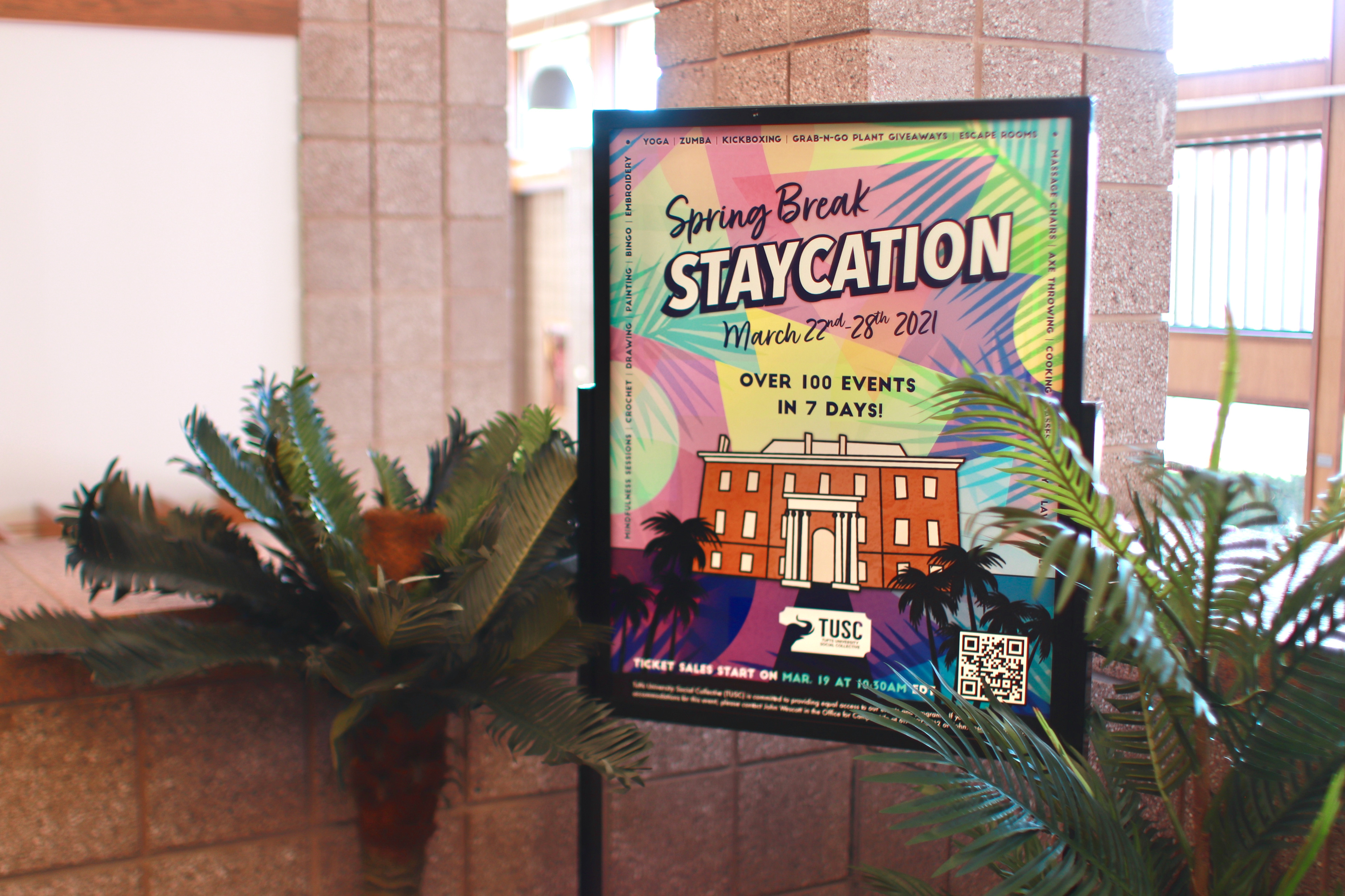 My poster hanging in the campus center main stairwell!